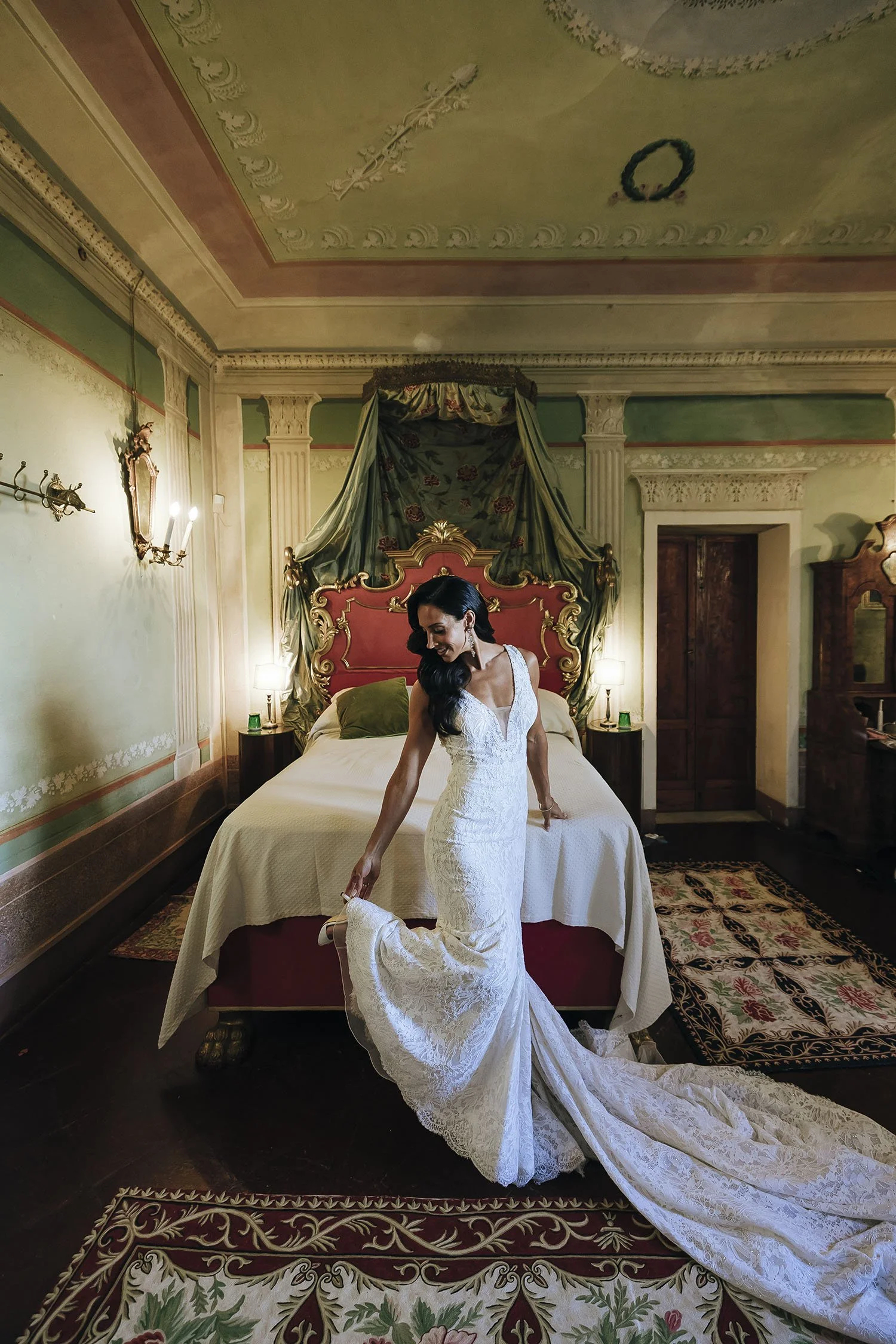 The bride getting ready in the room at Borgo Stomennano