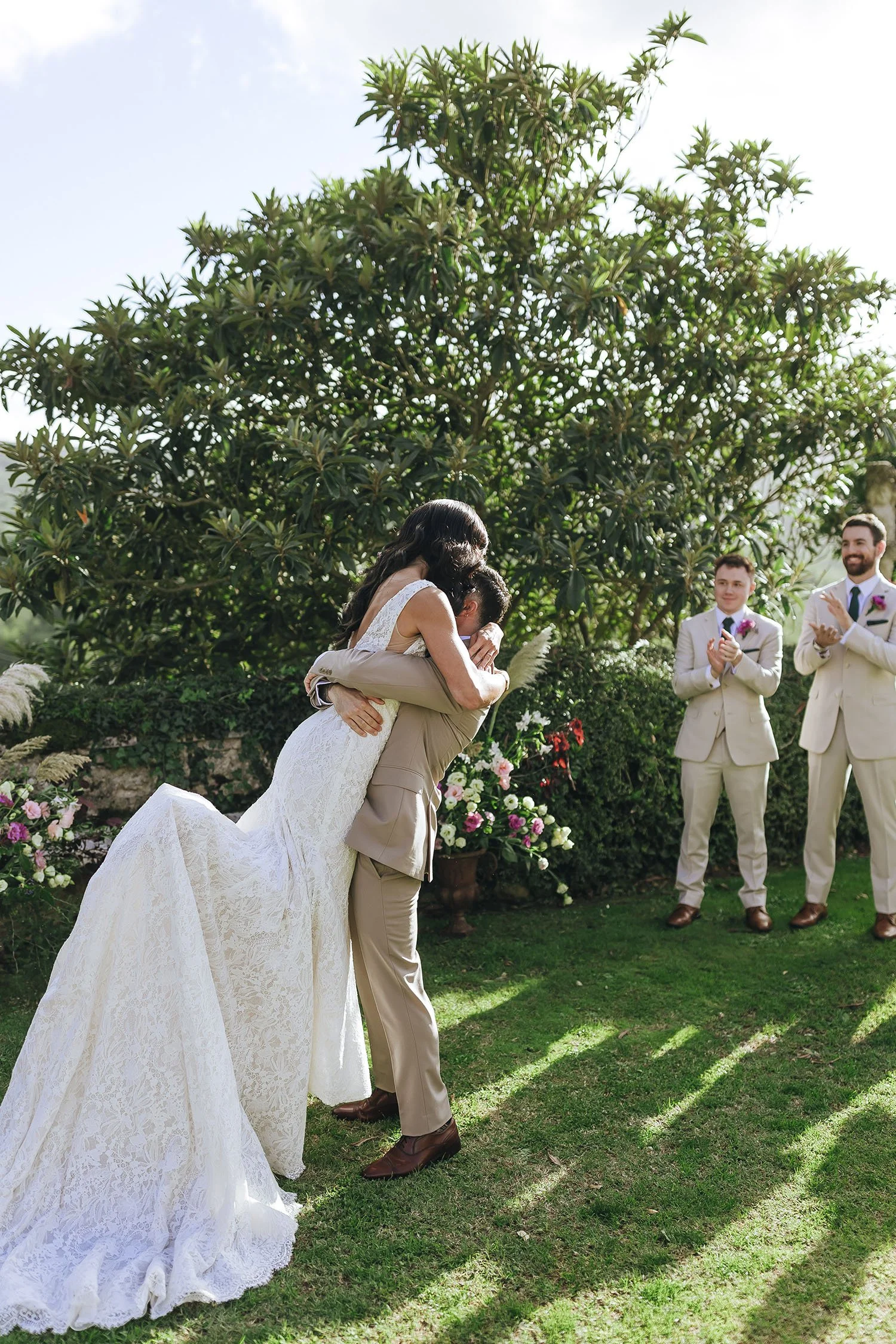 first kiss of the bride and groom after the ceremony