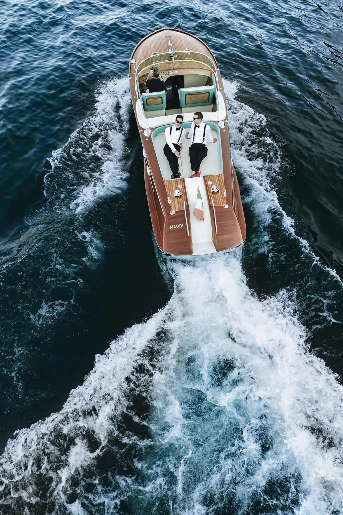 editorial style photo of two groom on a same sex destination wedding in Lake Como with magazine style by Rellini art studio, best wedding photographers in Italy