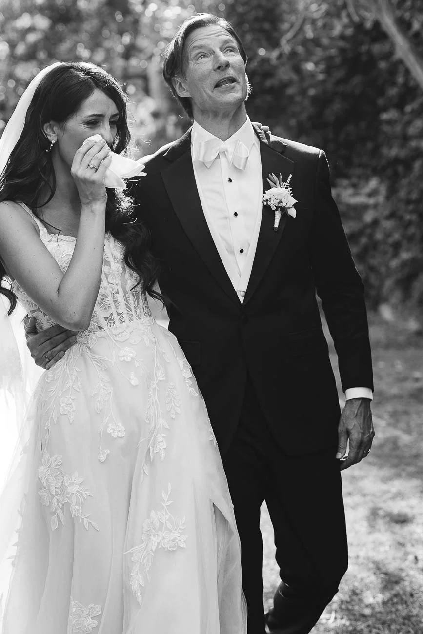 Bride and groom crying after the ceremony at Castello di Montegufoni
