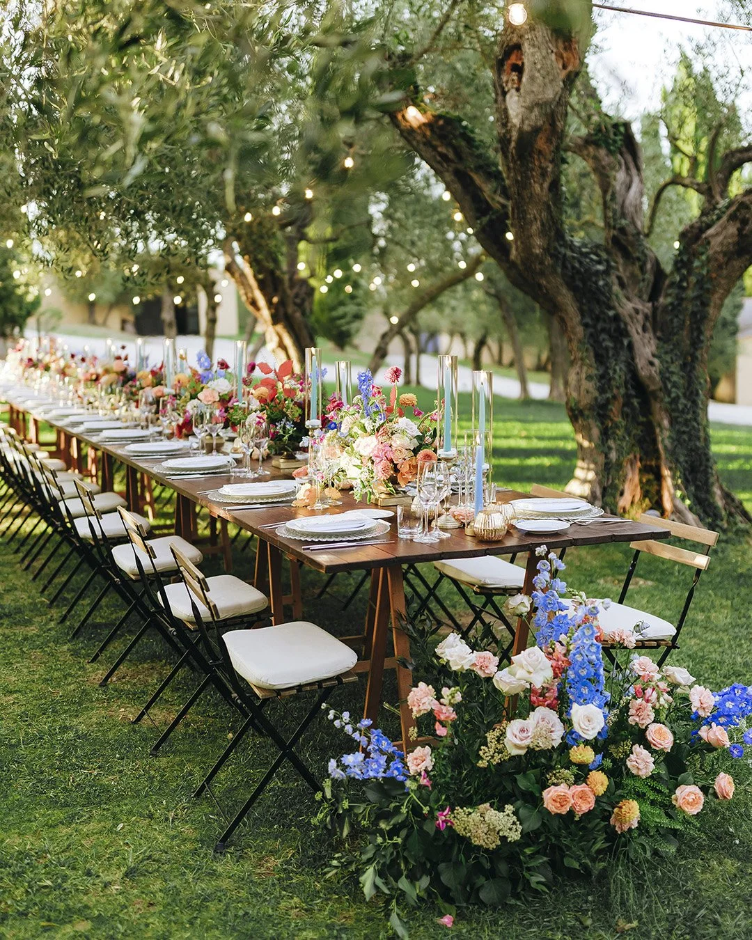 Dinner table and decor under the olive trees