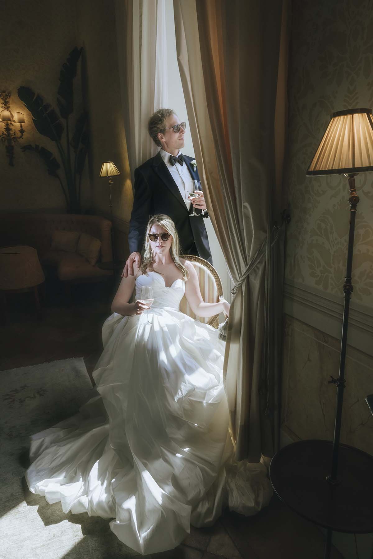 Classy and timeless portrait of bride and groom at Hotel Caruso Belmond Hotel in Ravello. Photo by Rellini art studio destination wedding photographer in Amalfi