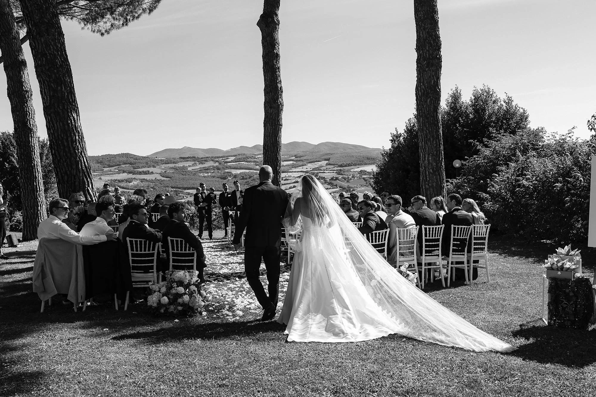 the bride is walking down the aisle with her father