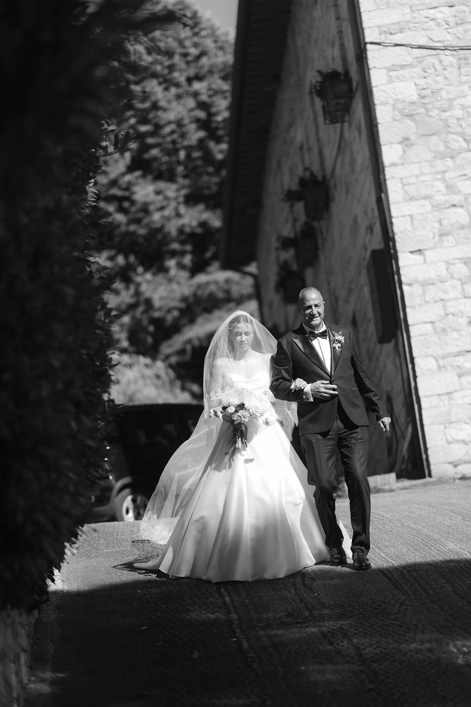 the bride is walking down the aisle with her father