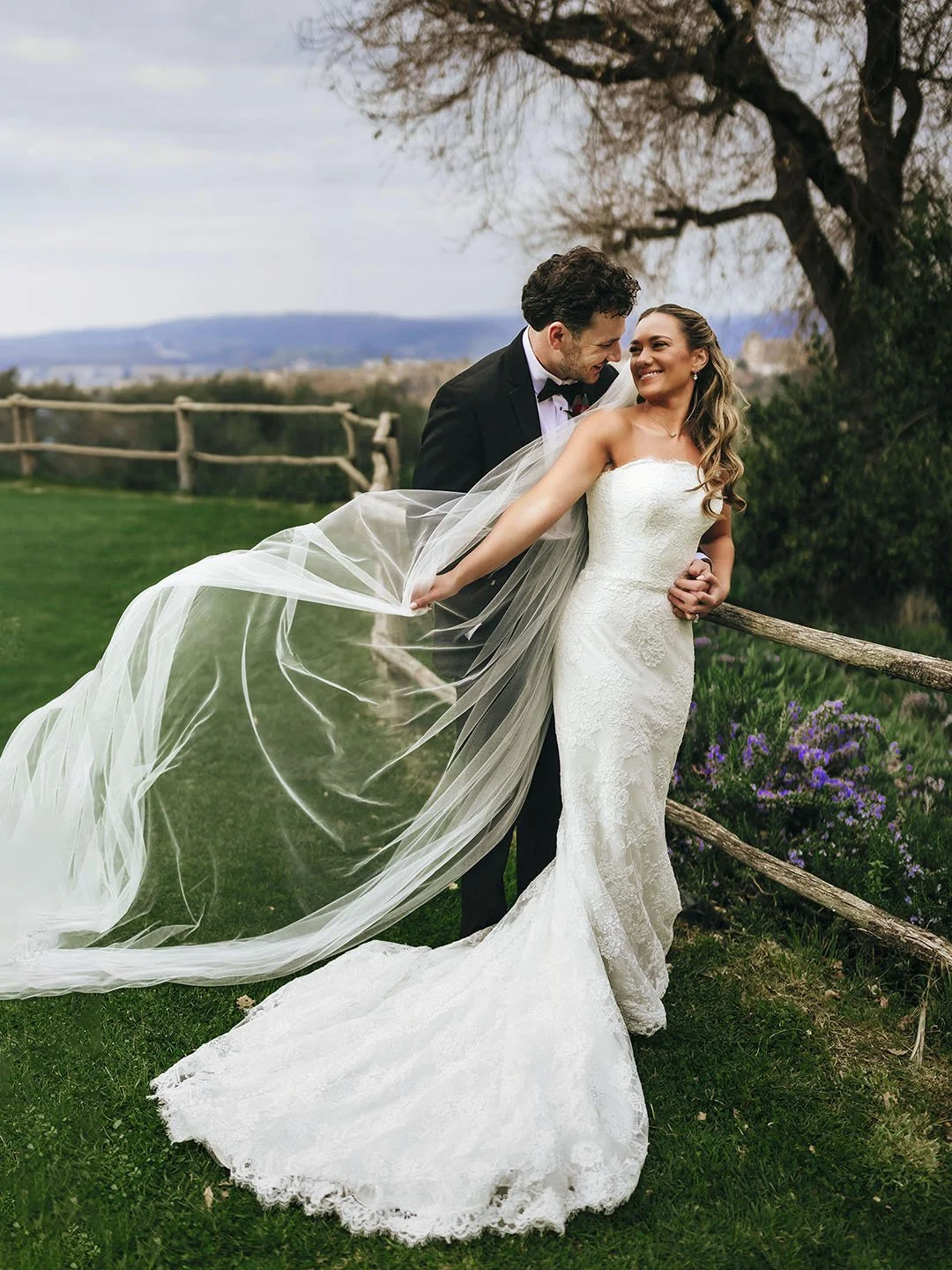 Bride and groom holding each other, photo by Rellini art studio