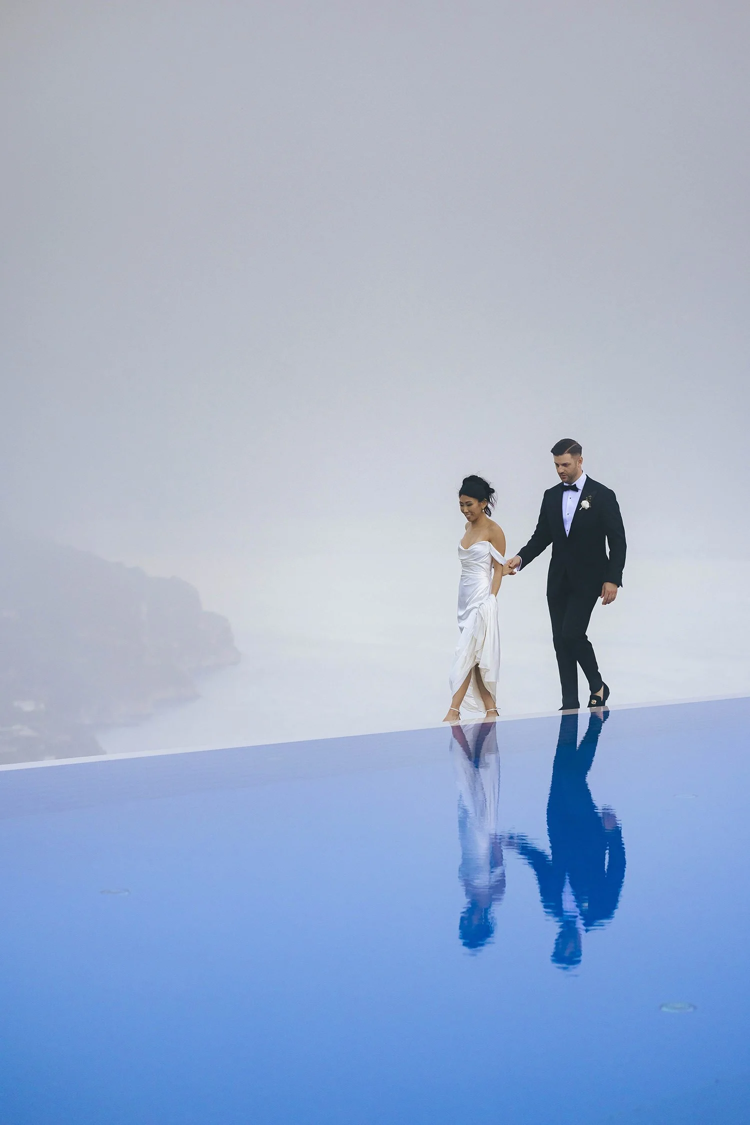 editorial style photo pf the bride and groom at Hotel Caruso in Ravello with magazine style by Rellini art studio, best wedding photographers in Italy