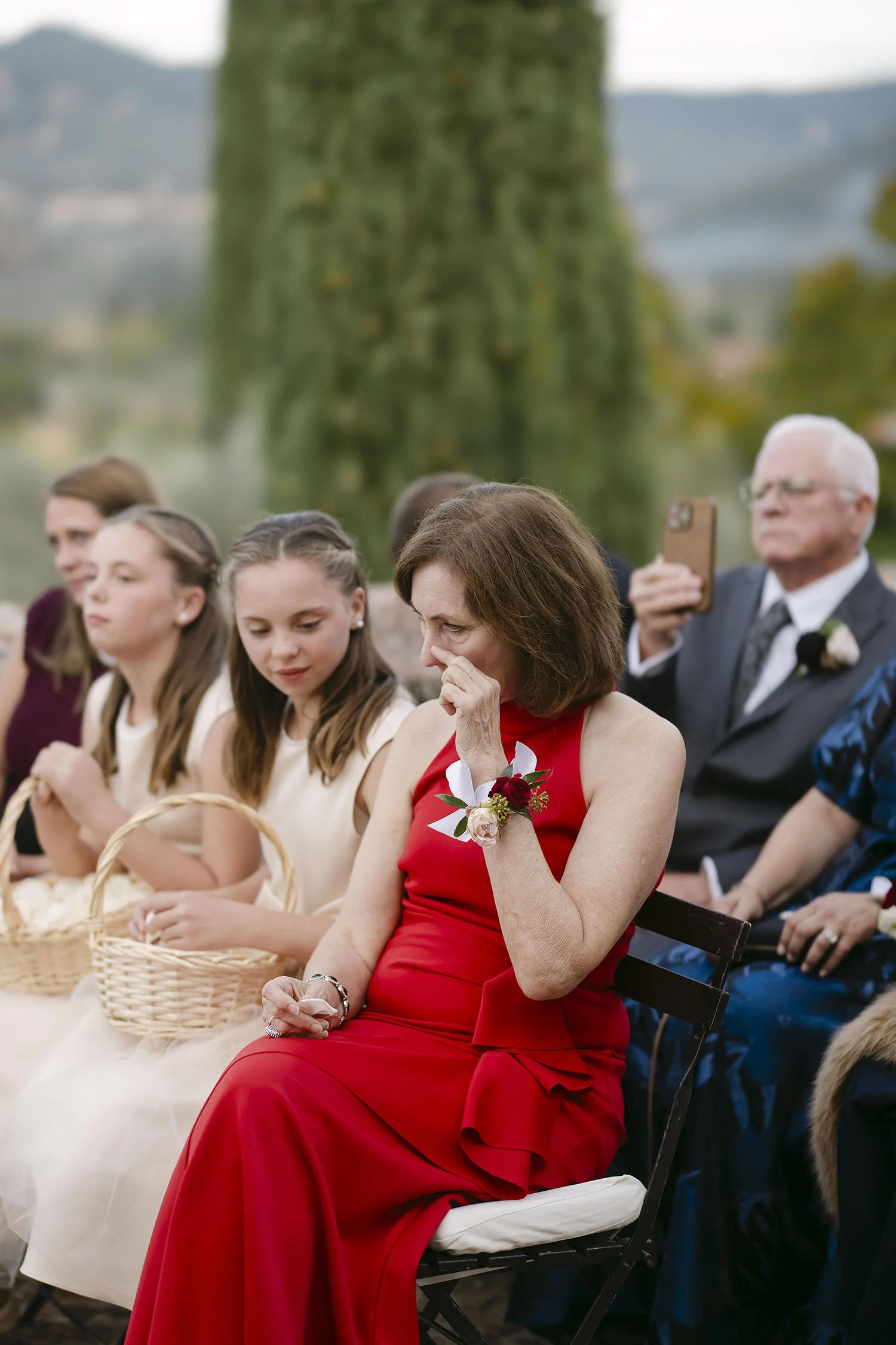 The mother of the groom crying for emotion during the ceremony