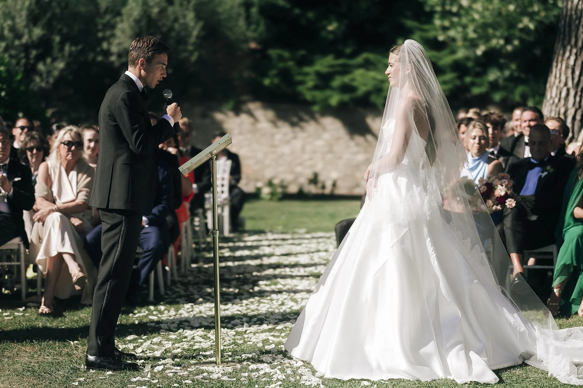 groom and bride exchanging vows facing each other