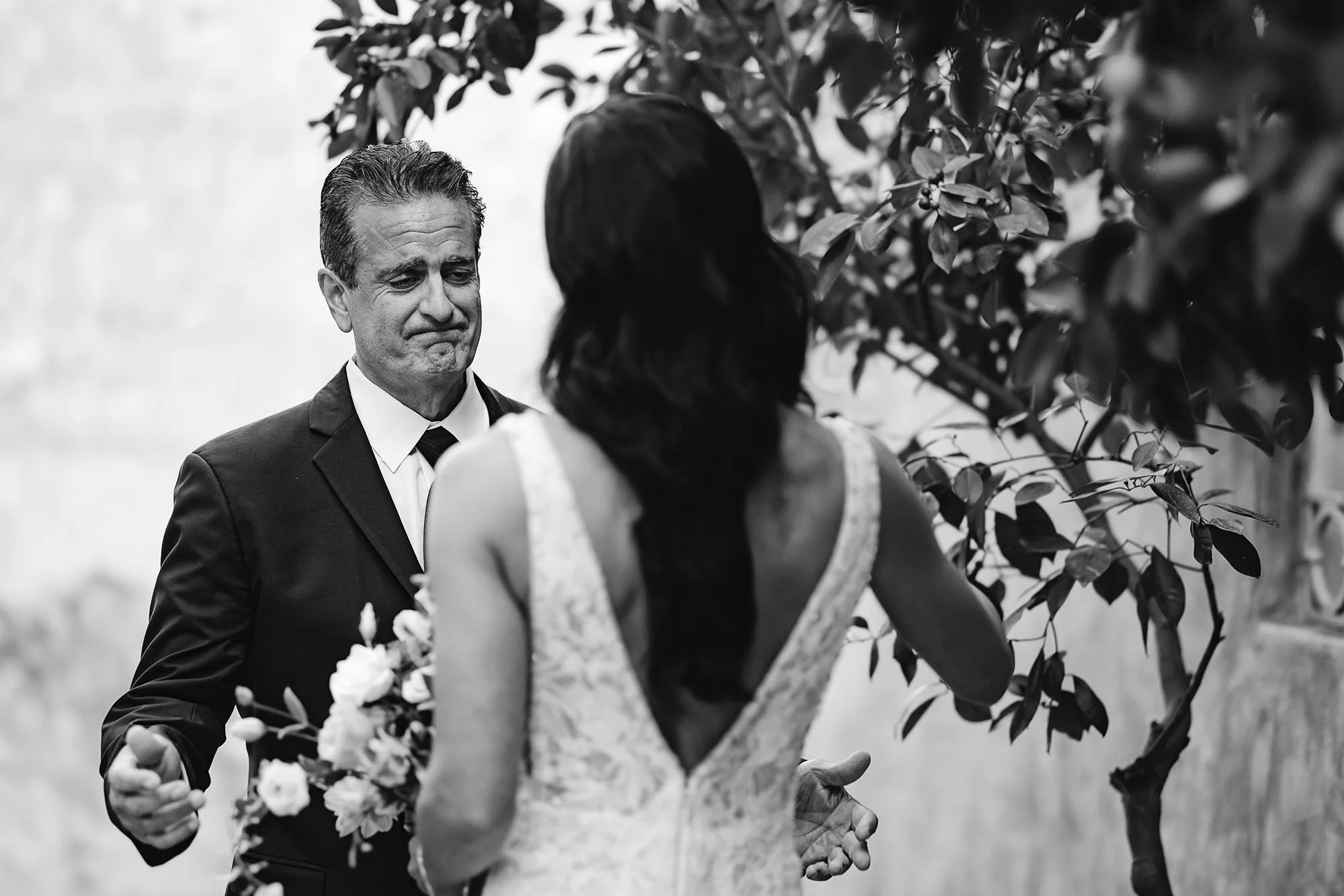 fist look of the bride with the father of the bride