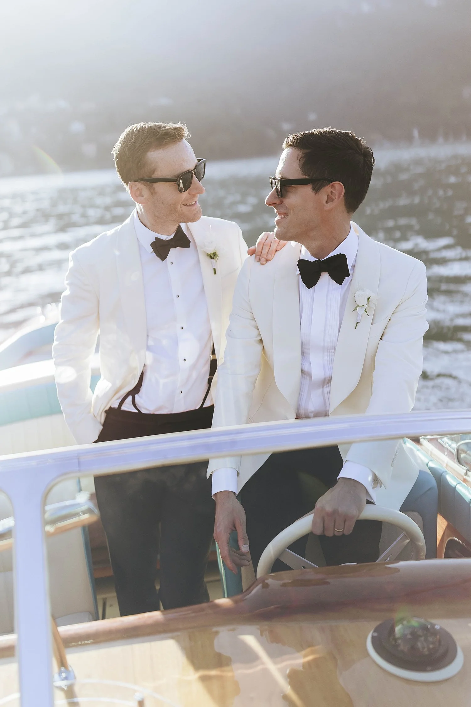 editorial style photo of two groom on a same sex destination wedding in Lake Como with magazine style by Rellini art studio, best wedding photographers in Italy