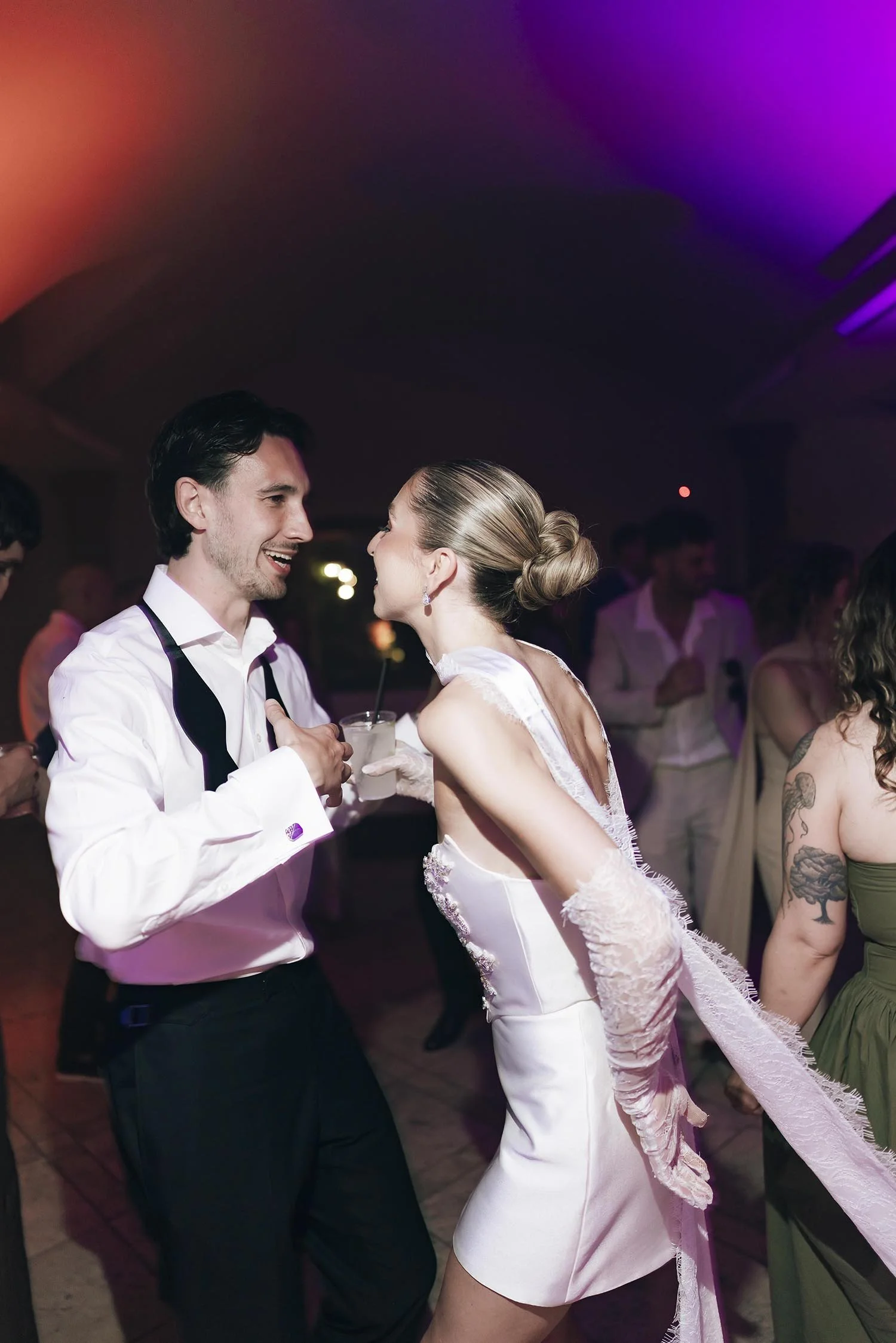 bride and groom dance together