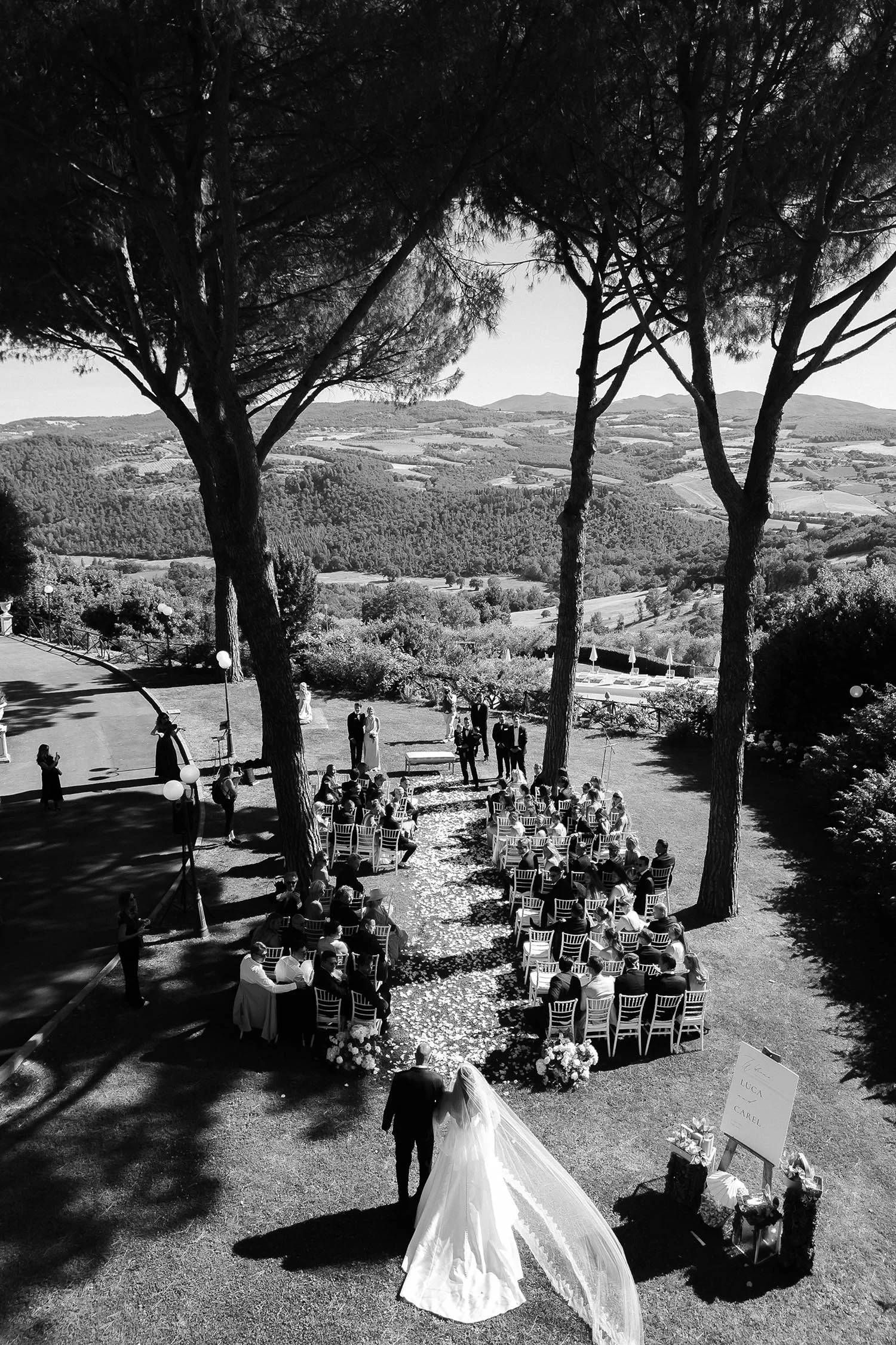 aerial view of the bride walking down the aisle with her father