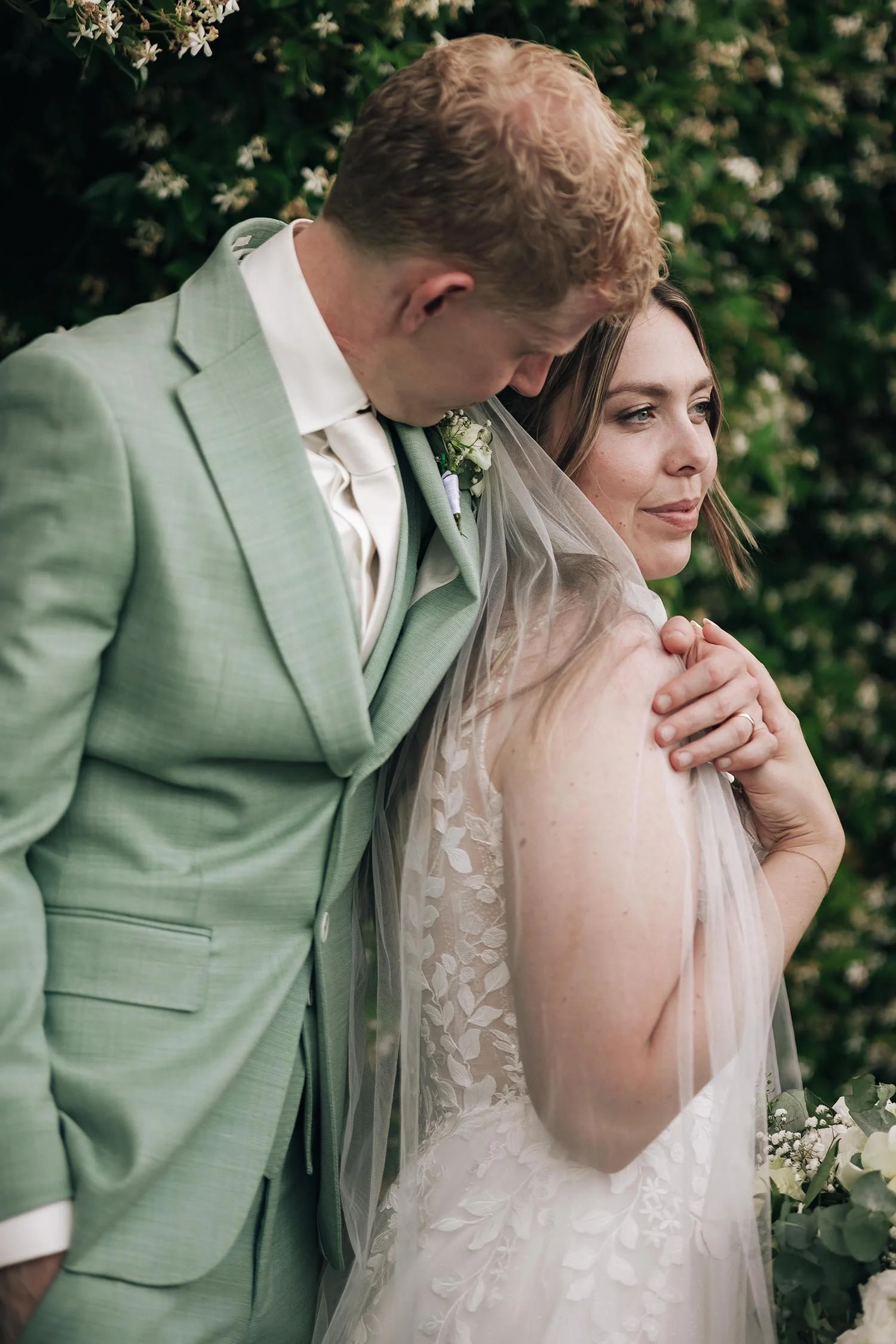Groom holding the bride
