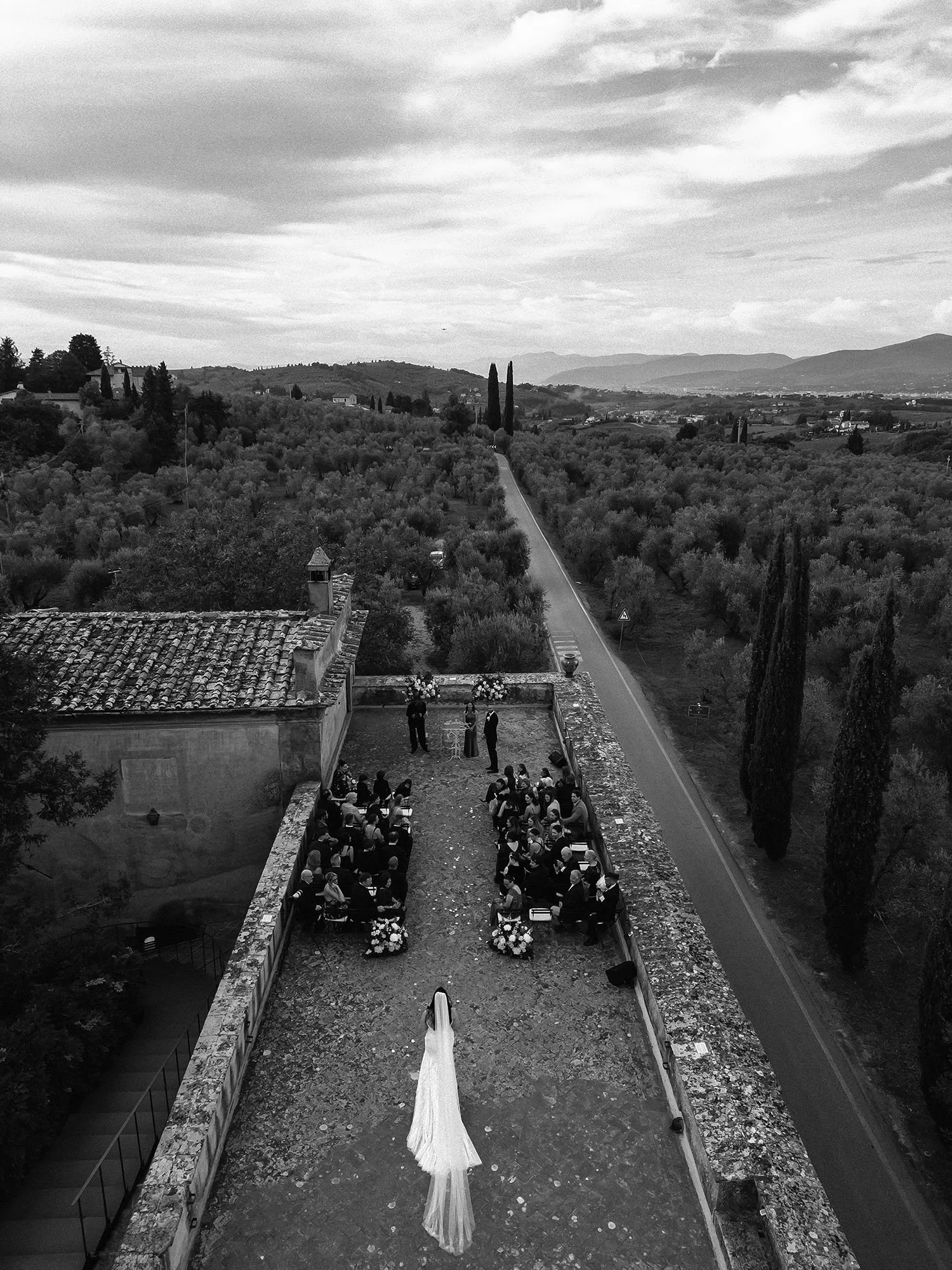 Aerial view of the bride walking down the aisle