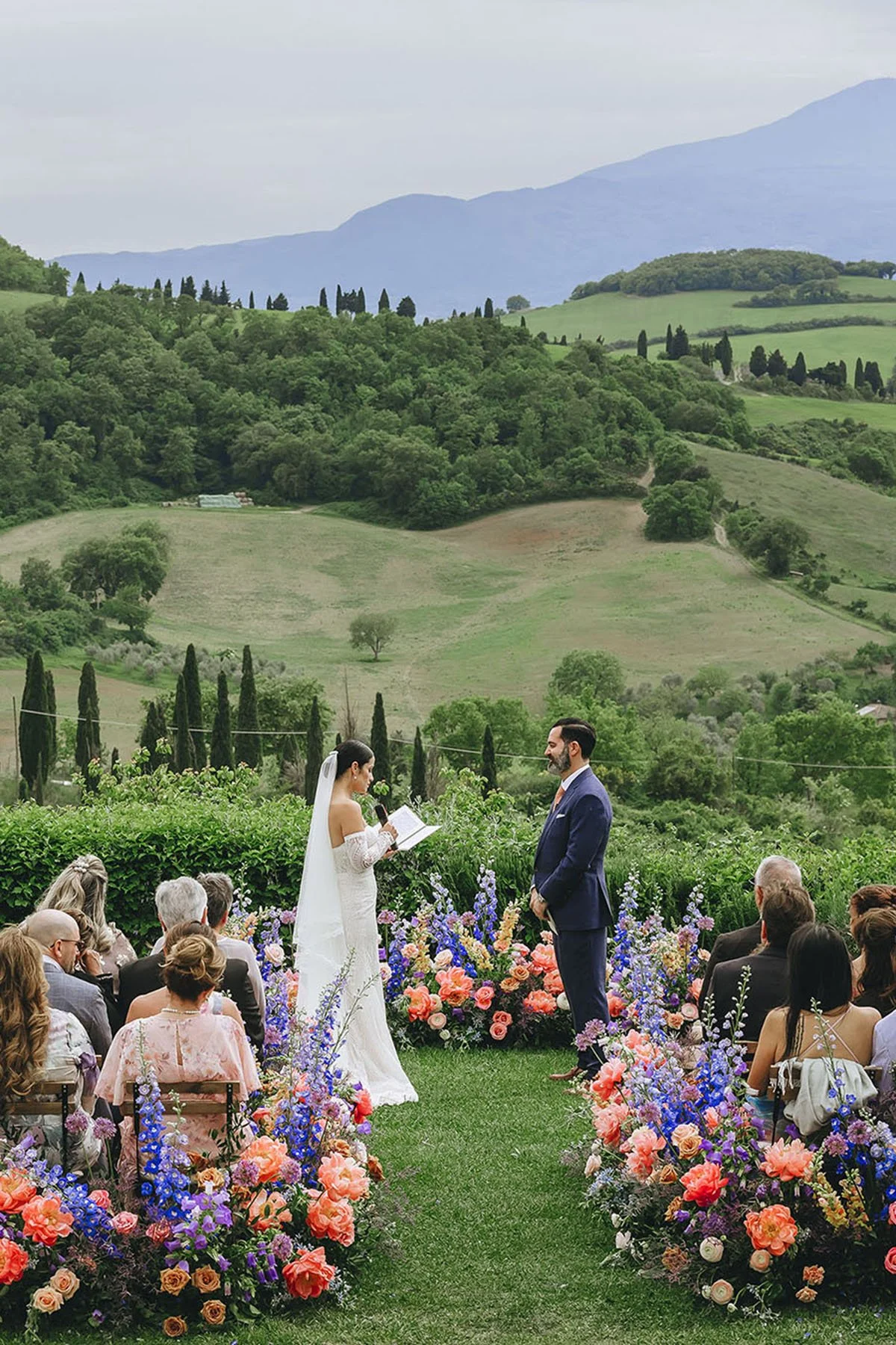 bride and groom exchanging vows during their intimate ceremony