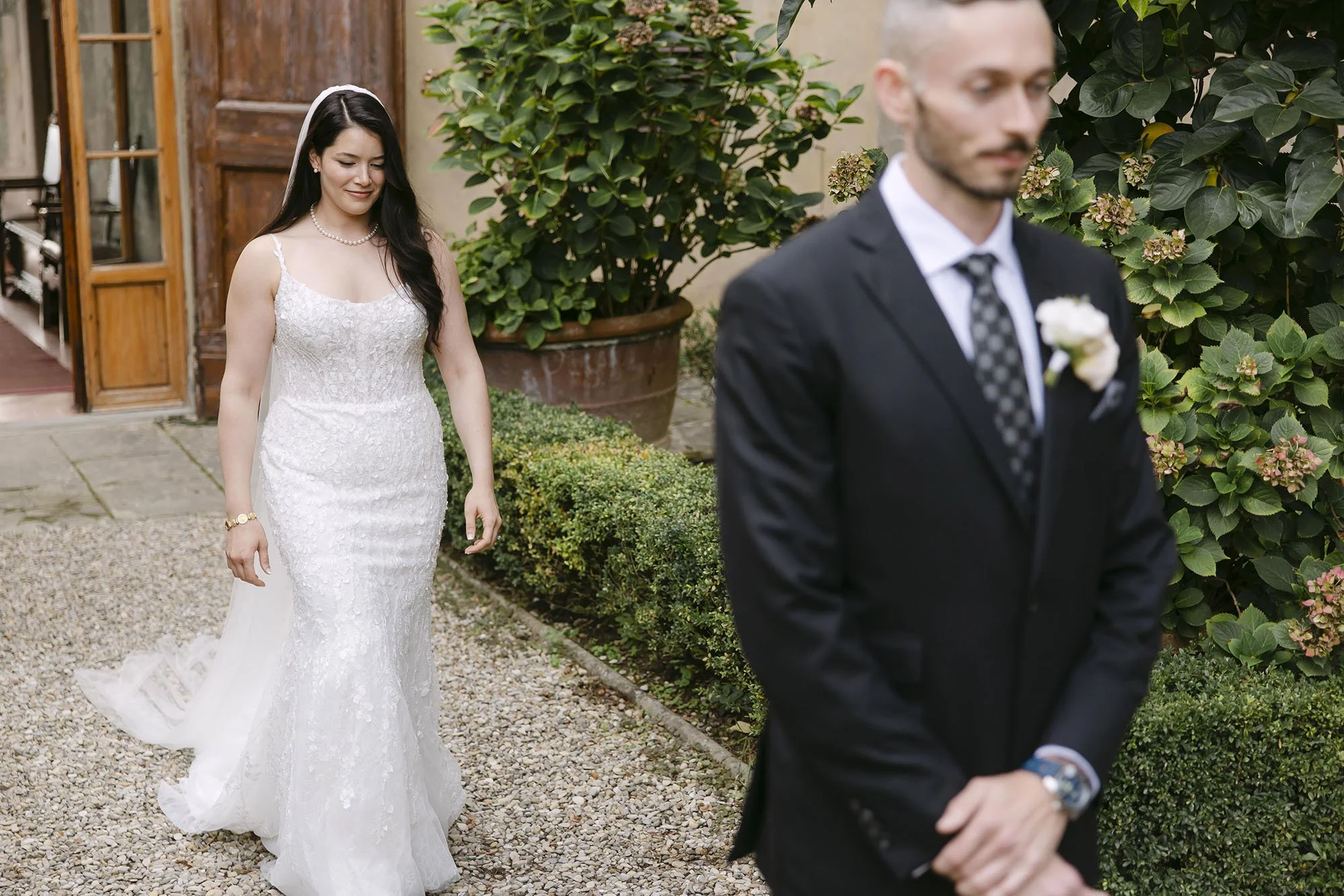 The bride approaching the groom for the first look