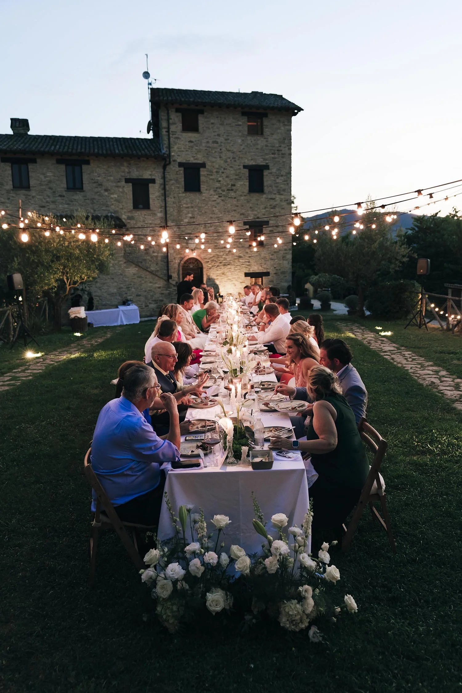 dinner table by night at Borgo Castello Panicaglia