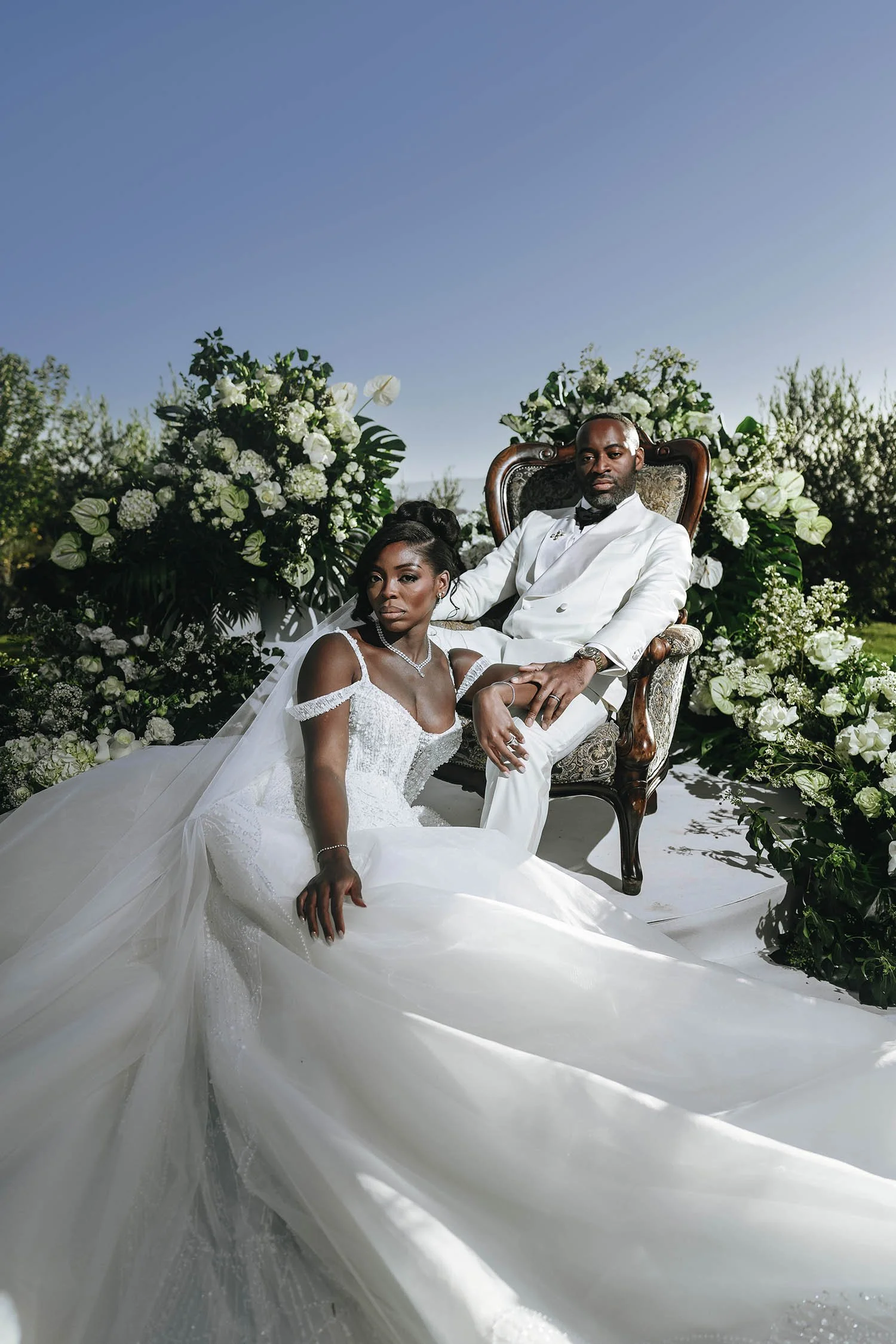 Bride and groom posing for an editorial magazine style photo at Castello di Petrata, photo by Rellini art studio best wedding photographer in Umbria