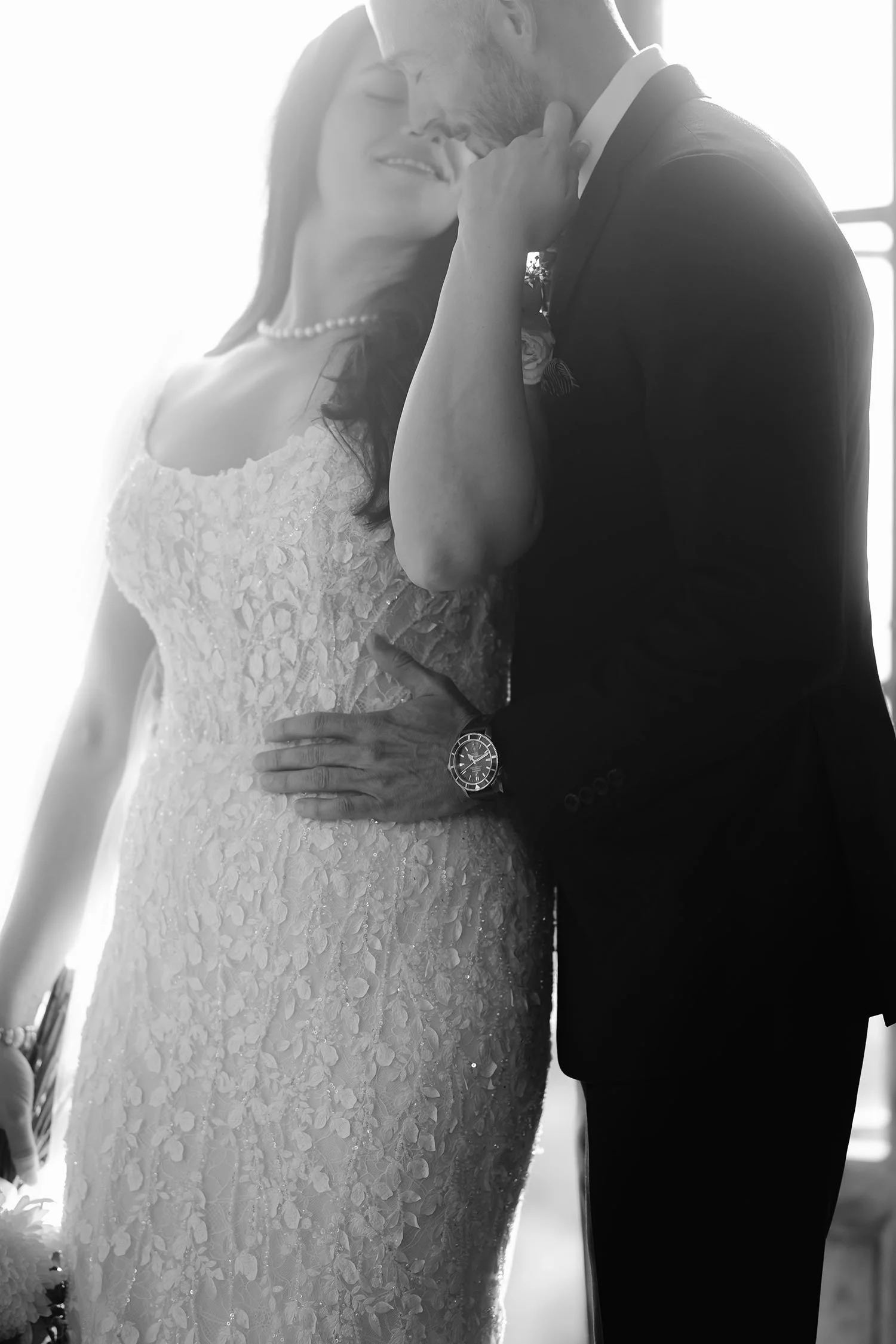 Romantic kiss of bride and groom