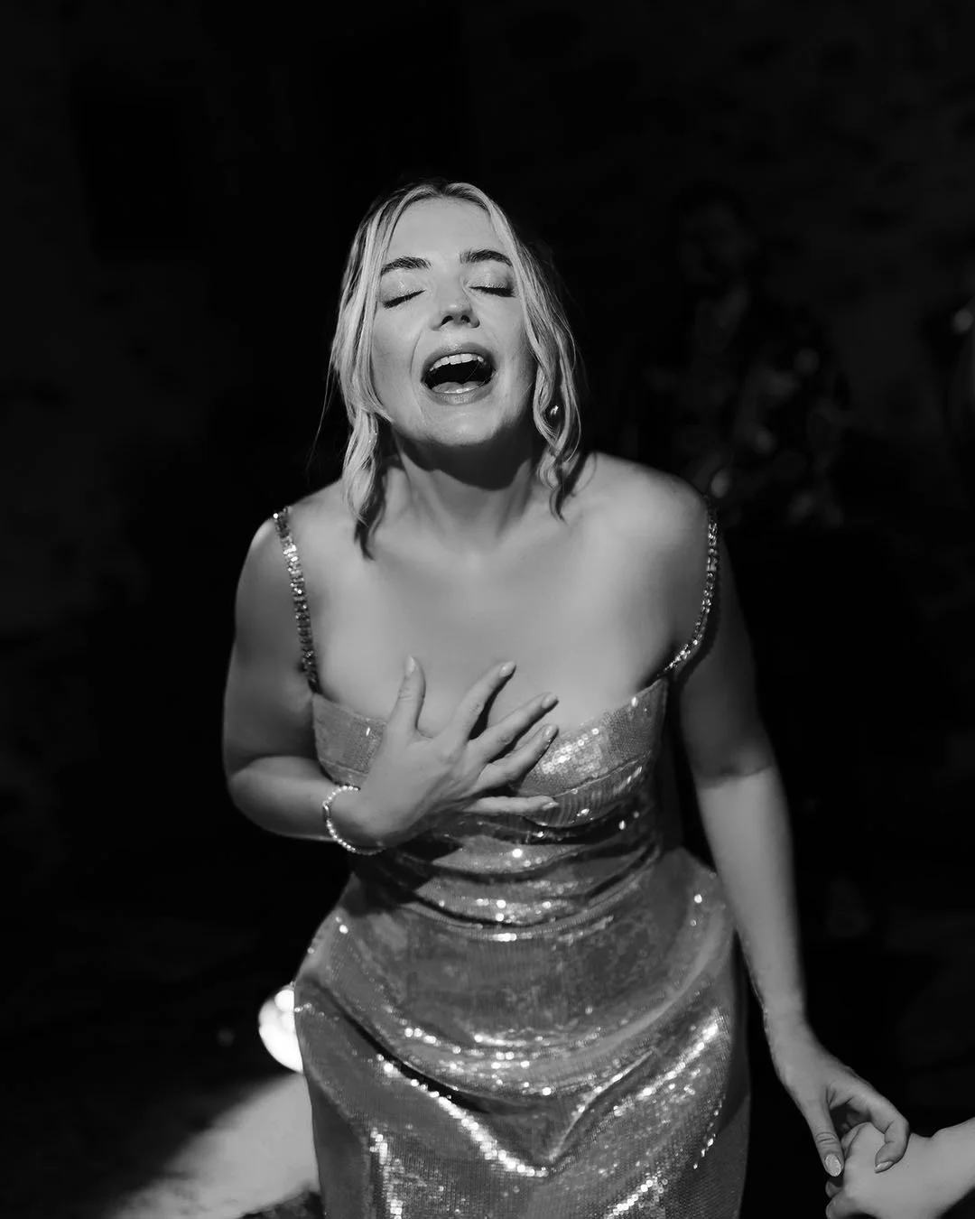 bride singing during the wedding party