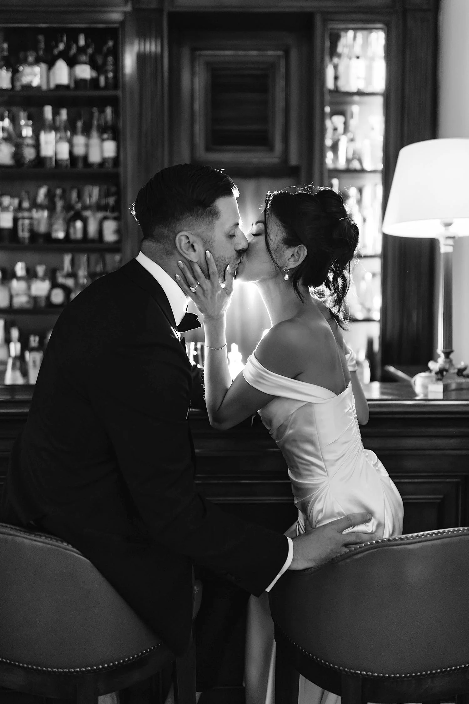 Bride and groom kissing at the bar of Hotel Caruso in Ravello. Photo by Rellini art studio best wedding photographer in Umbria