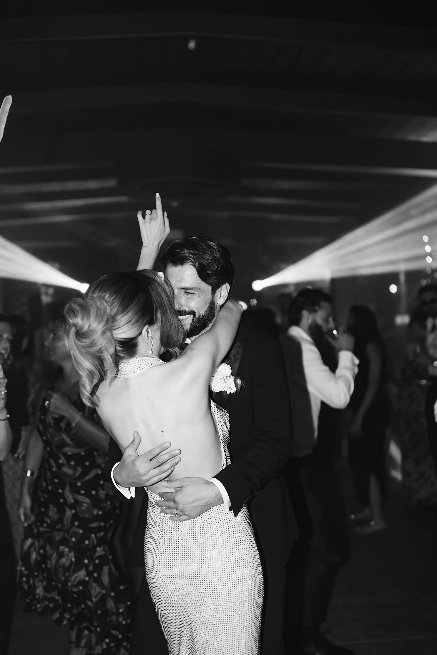 bride and groom dance together on te dancefloor