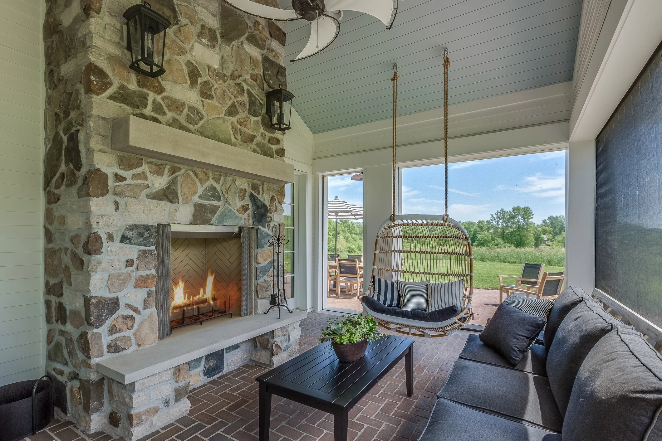 screen-porch-fireplace-swing