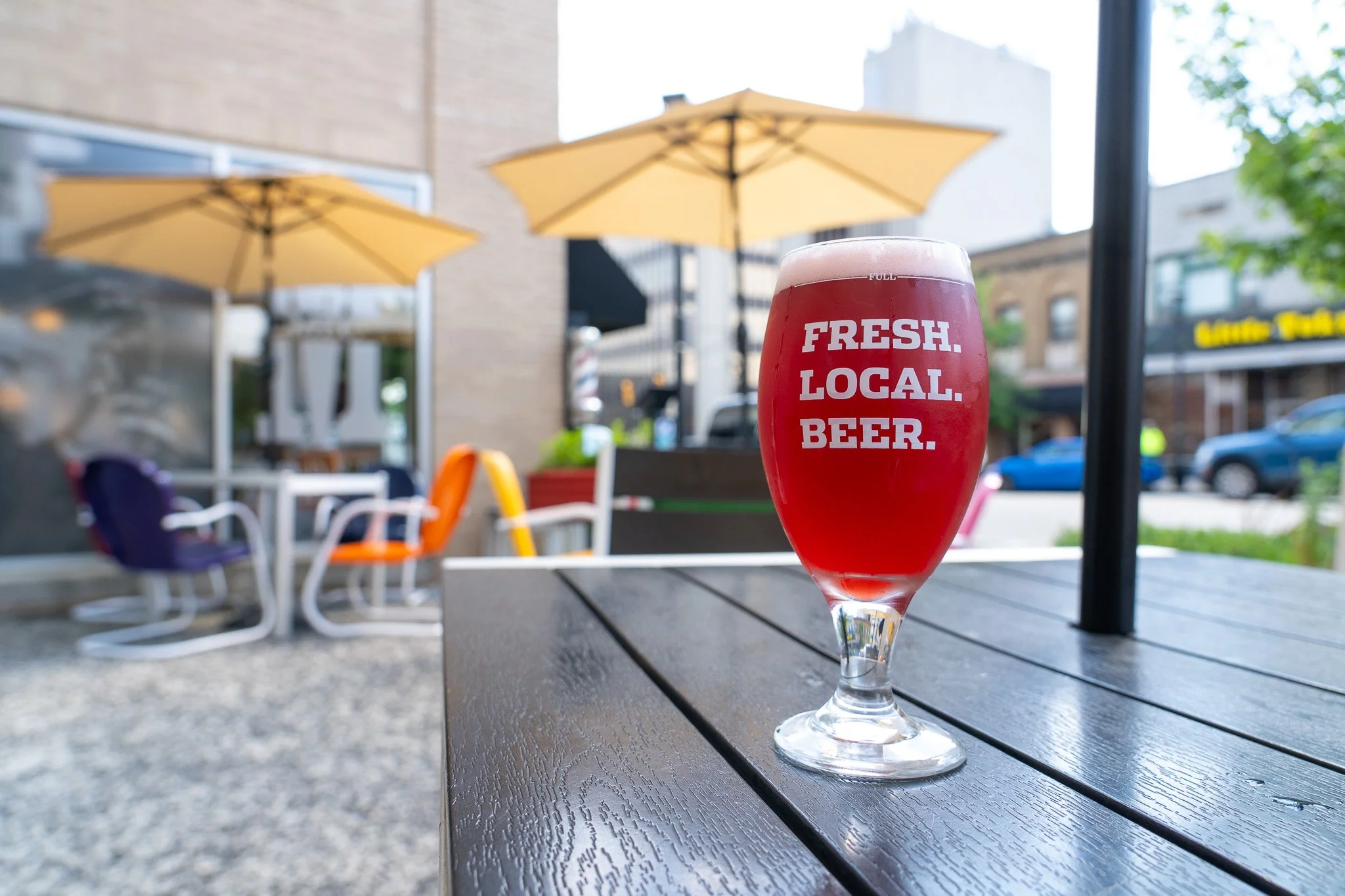 Sour Beer under Patio Umbrellas