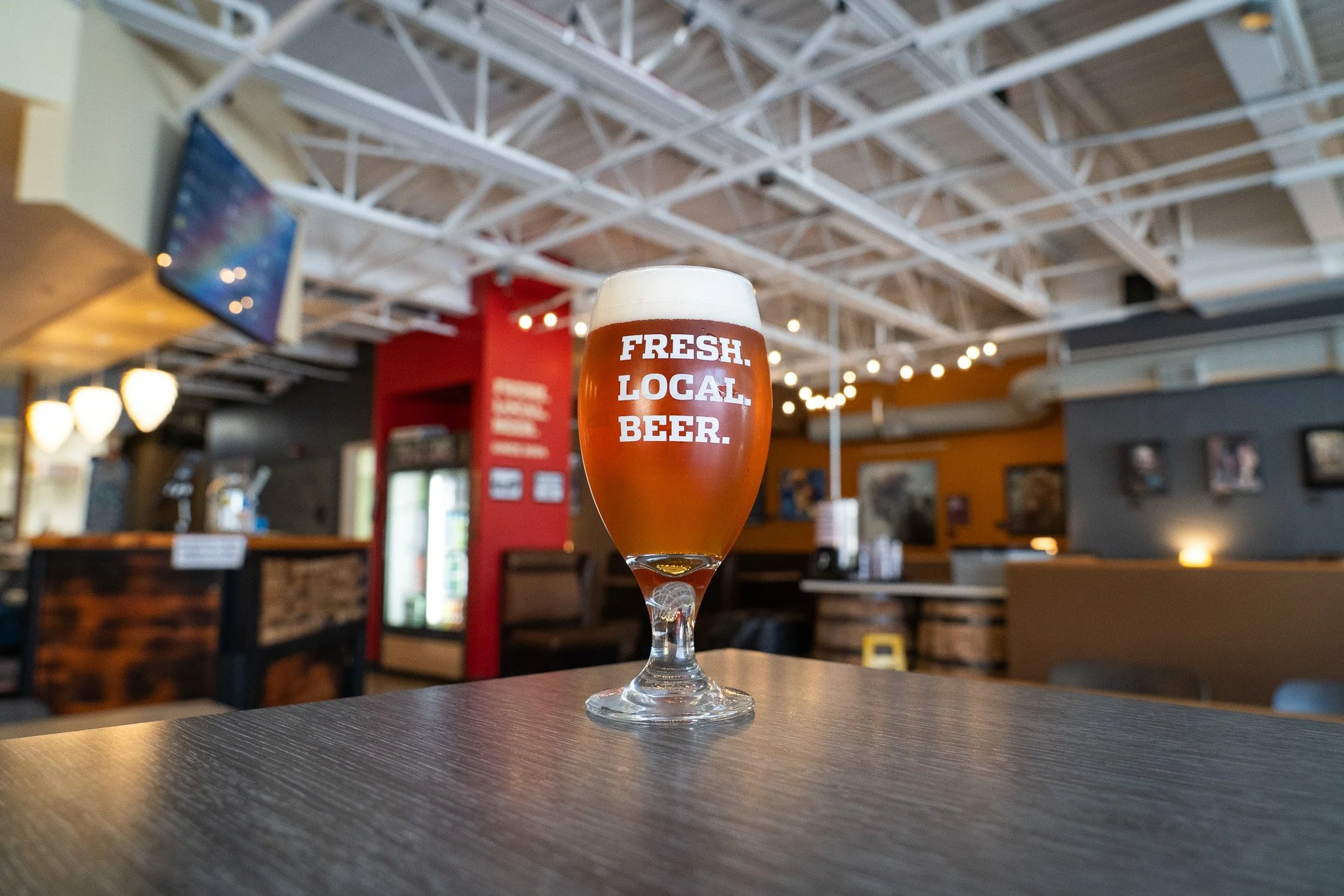 Fresh, cold beer in brewery taproom