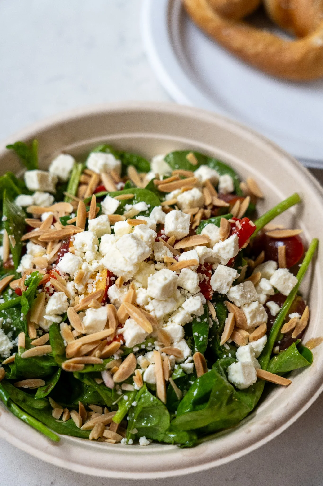 Summer salad with crumbled cheese