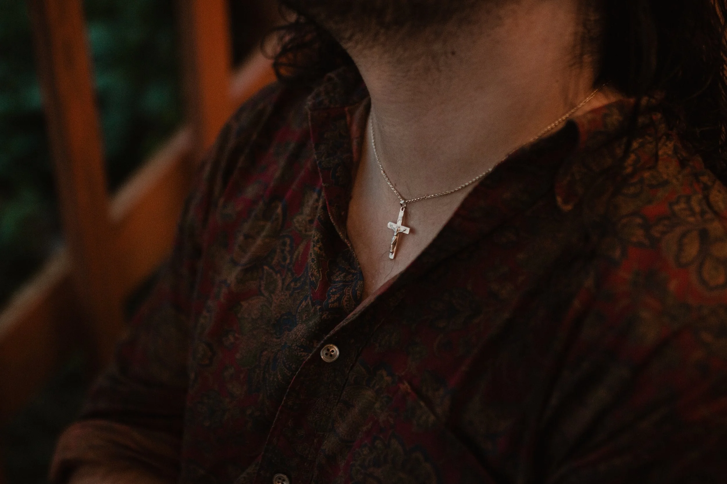 I wanted to do a photo shoot with that necklace and the symbolism that it has for [my husband] personally. He was raised Catholic and he now is Christian, but he wears this necklace all the time. I just did a photo shoot surrounding this necklace. — 