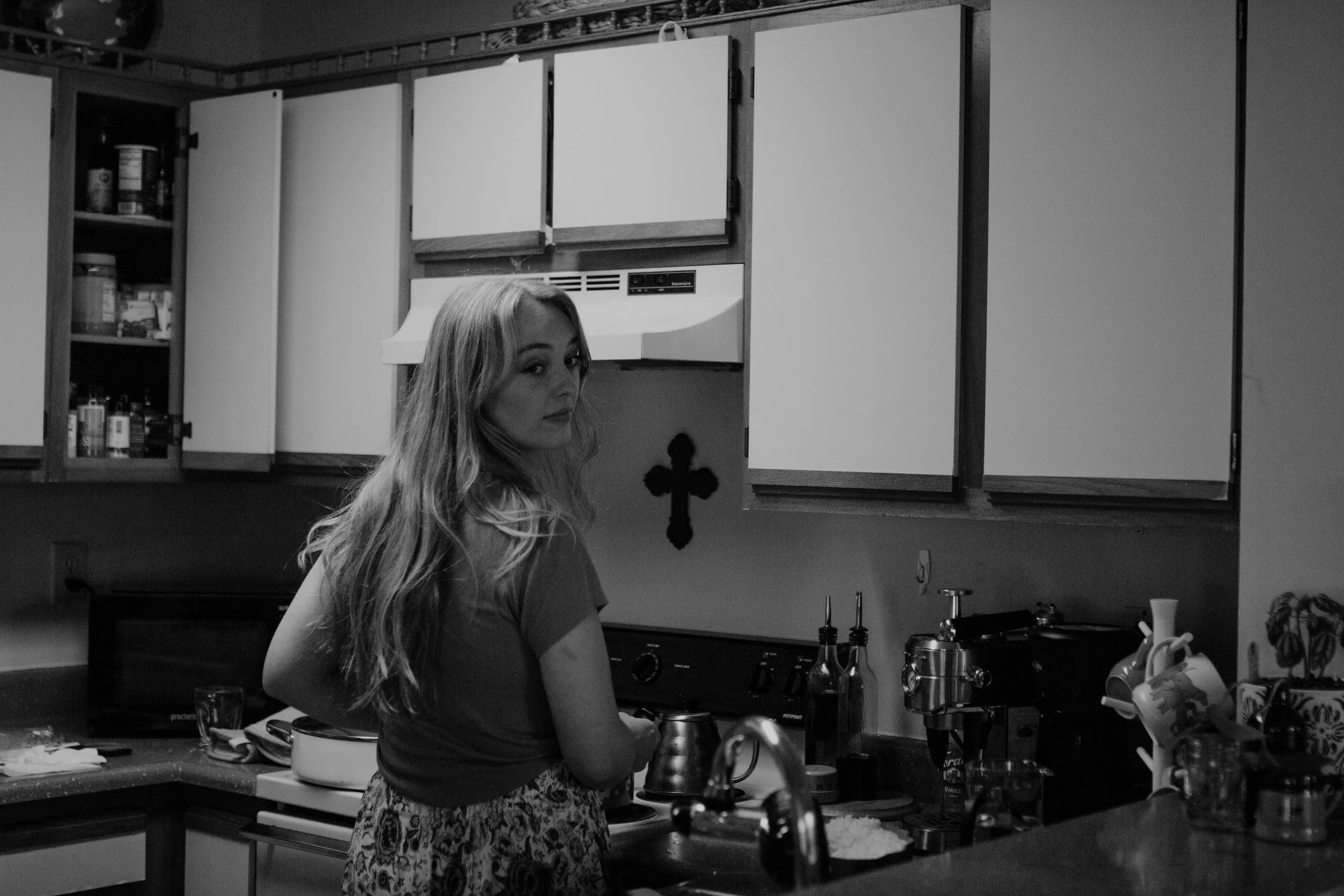 I really like the picture of Tessa looking back, she's looking at her husband and I don't know why this picture just does really speak to me. I'm not quite sure if I like it in black and white. I was playing around with it in color and the lighting i