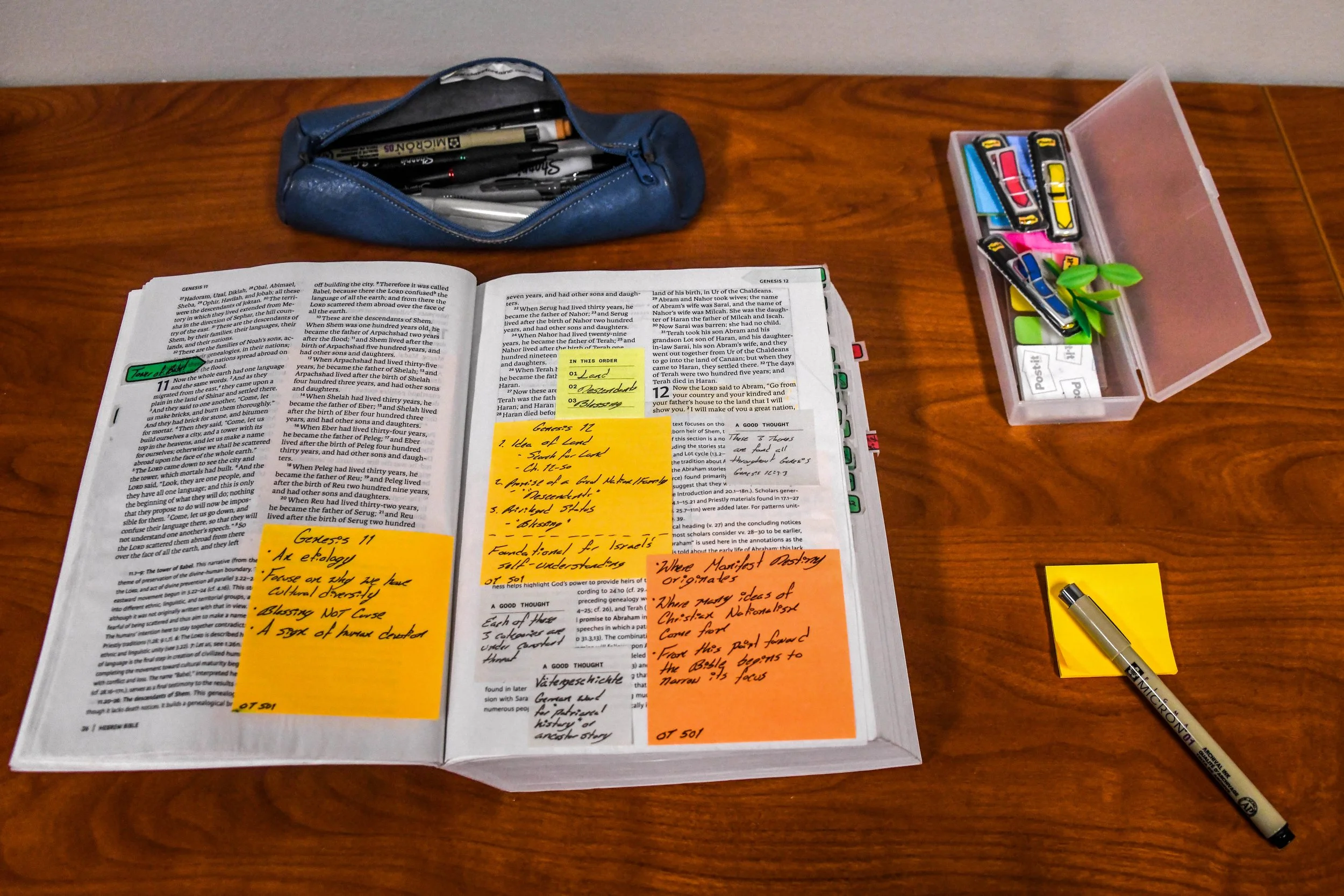 The Bible I use to take notes in. So I study divinity and currently I'm refreshing on old notes because I'm working at a summer type camp academy that empowers youth to think more theologically and intentionally about the divine. And so yeah, it just