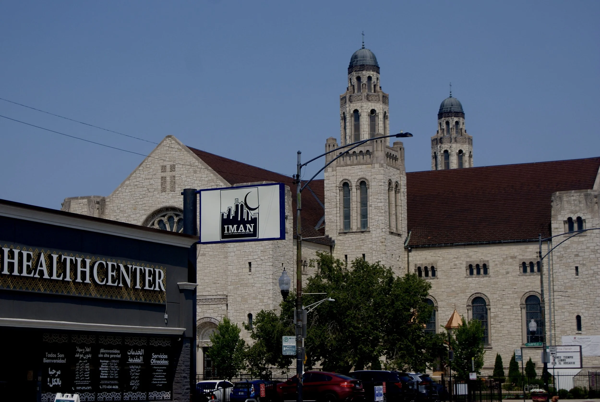 That's the IMAN Health Center next to a church, which I thought was a cool juxtaposition, a nice showing of coexistence and love. — Fatima Zaid