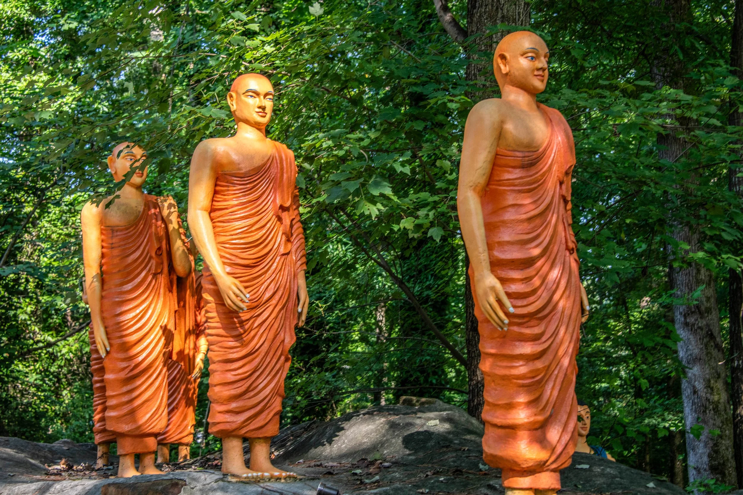 We took our youth to the Georgia Buddhist Vihara earlier this week and Vihara is basically in the early type of monastery consisting of open court. And my youth were just learning about Buddhism being exposed. This photo shows some statues of a few m