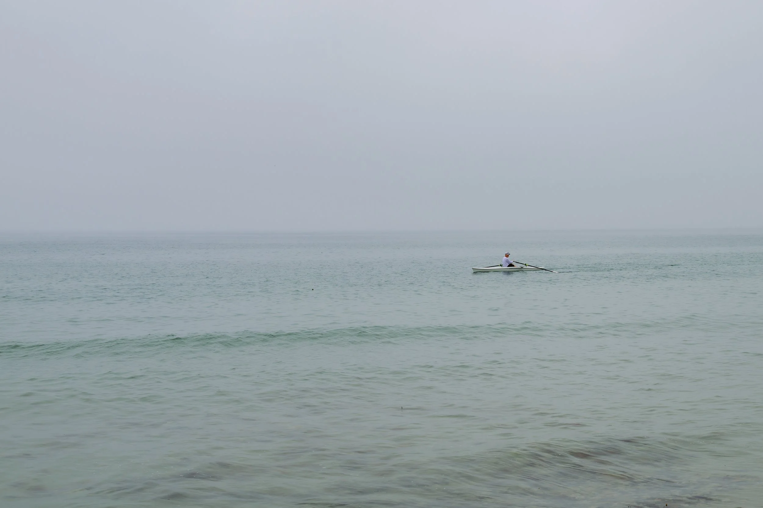 I find spirituality, or feel humble and small, in a good way. That I am part of something big, perpetual, infinite.    

I saw this guy rowing, an ocean skull. This is kind of insane because it's dangerous, the ocean can have powerful currents here. 