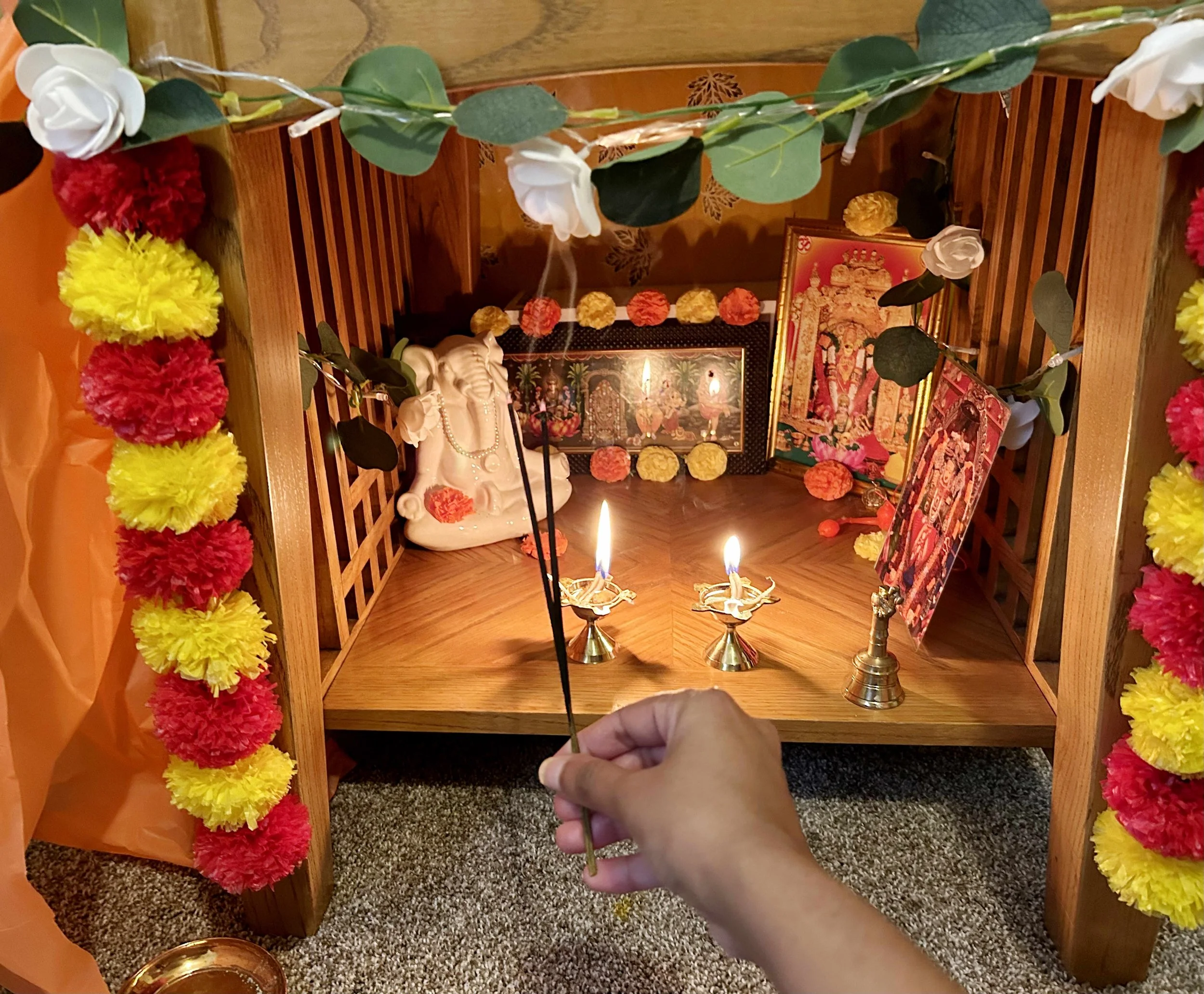 "Puja is a religious ritual practiced in many Indian homes, including mine as an Indian living in America. In this ritual, lamps are lit as an offering to the divine. The light from the lamp symbolizes knowledge and the power of the sacred, while the