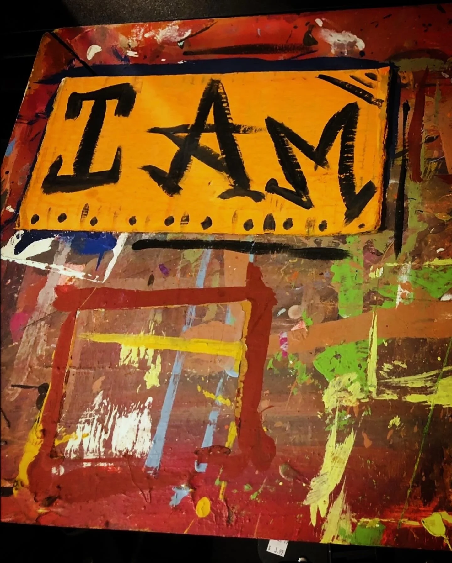 It must have been like someone's leftover, what do they call it? Canvas or easel or something. And also “I am’ is a powerful statement. Who do you want to be and who do you want to be remembered for and remembered as. And then the idea of, I don't kn