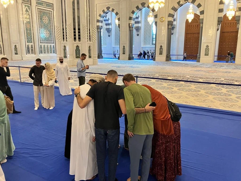 The diversity of our interfaith group is visible in a selfie taken in the midst of the beauty of the Grand Mosque. Just as the grand mosque embodies the diversity of the muslim world, we represent interfaith pluralism in action. — Tamer (Palestine)