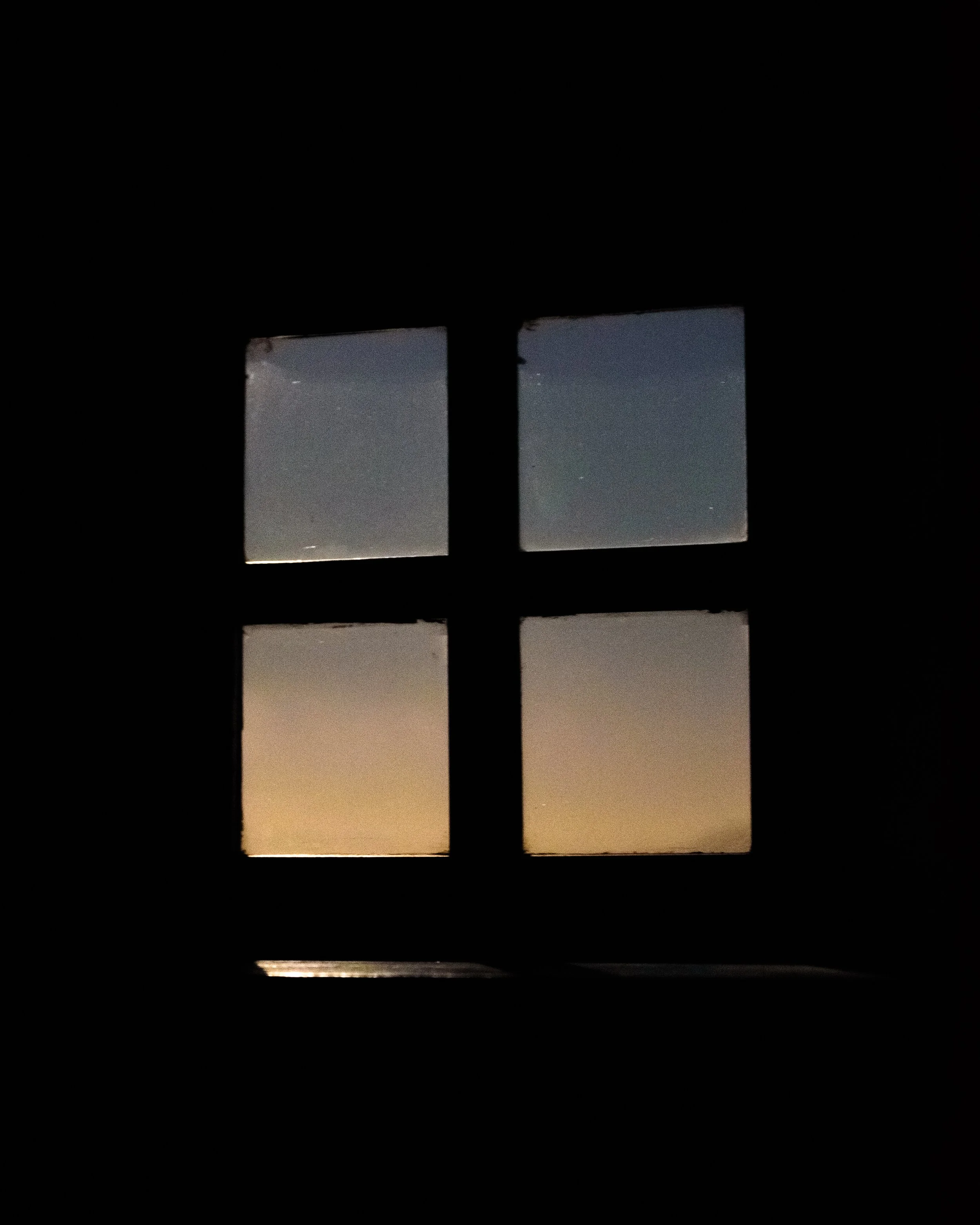 This image is from my little loft in County Kerry Ireland at twilight looking out over the Atlantic. So much about light, and the dark, I think represents that sense of spirituality.     — Julianne Gauron