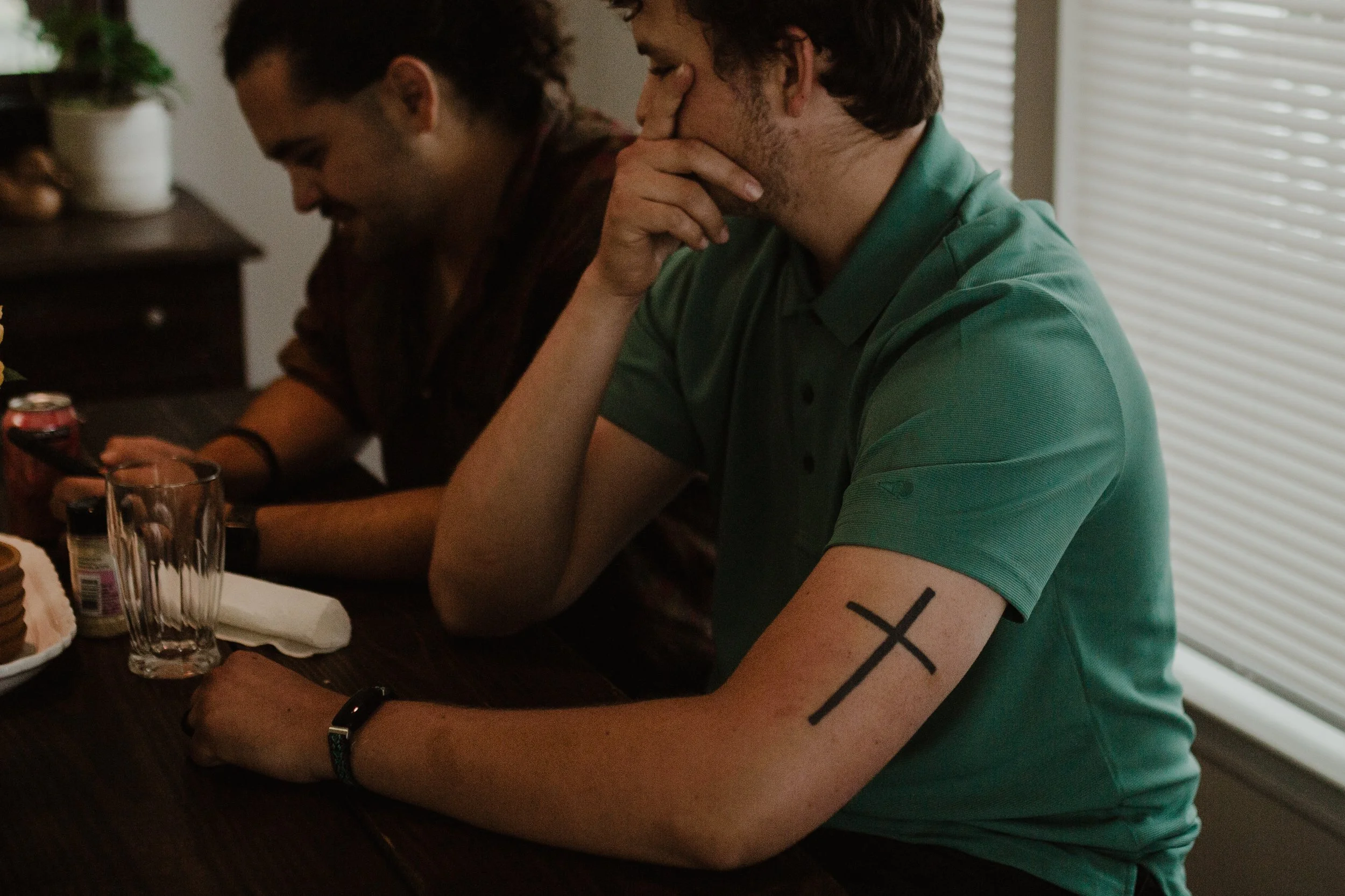 I took these pictures on Sunday of friends in our church small group. They are Christian and Cameron who's in the green shirt. He has this cross tattoo that I really wanted to photograph and I thought these turned out really good.     — Joanna Schaus