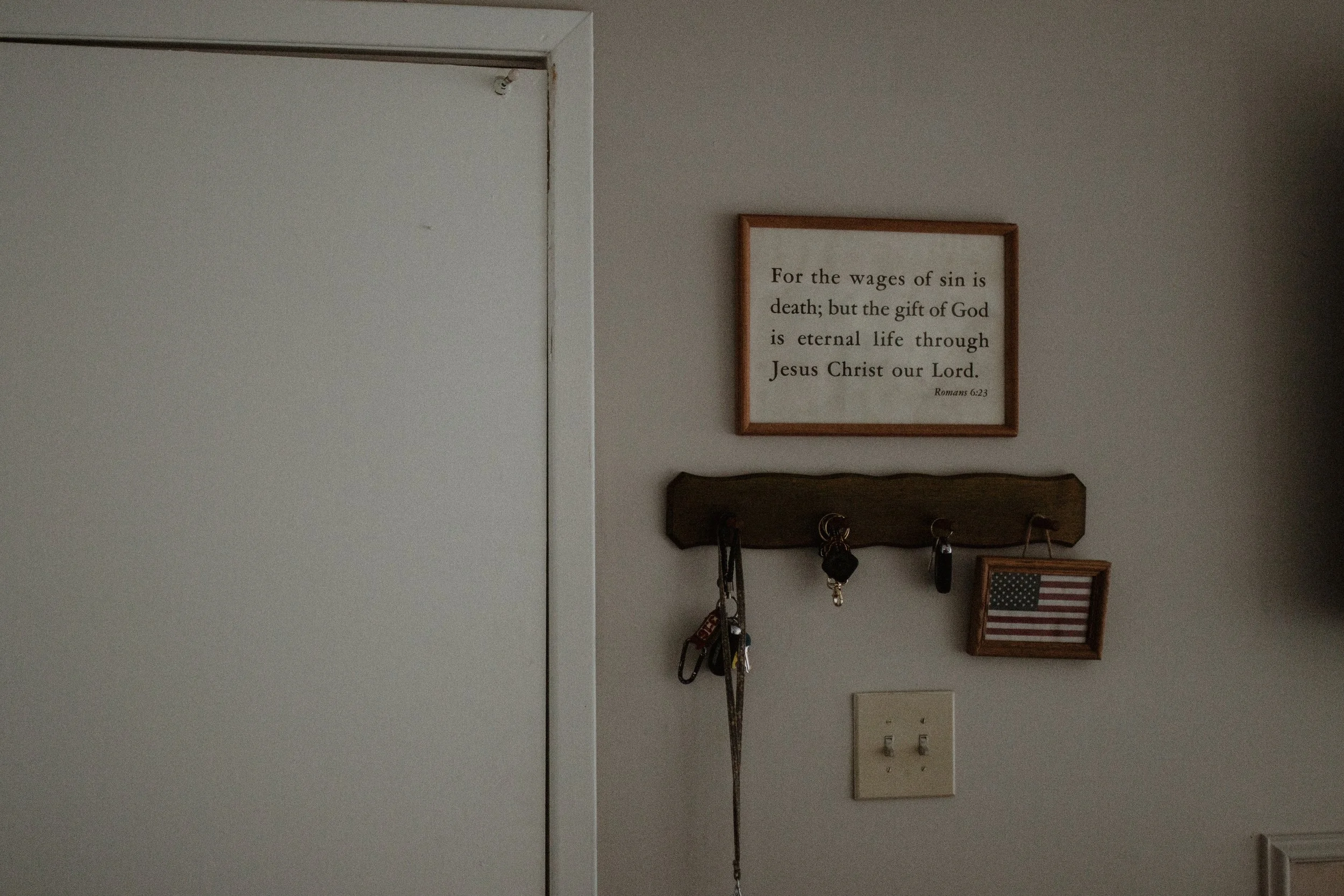 This was a verse that was on their wall: “For the wages of sin is death, but the gift of God is eternal life through Jesus Christ our Lord.” I also think that it kind of ties into that Christian nationalism idea that I just really personally reject. 