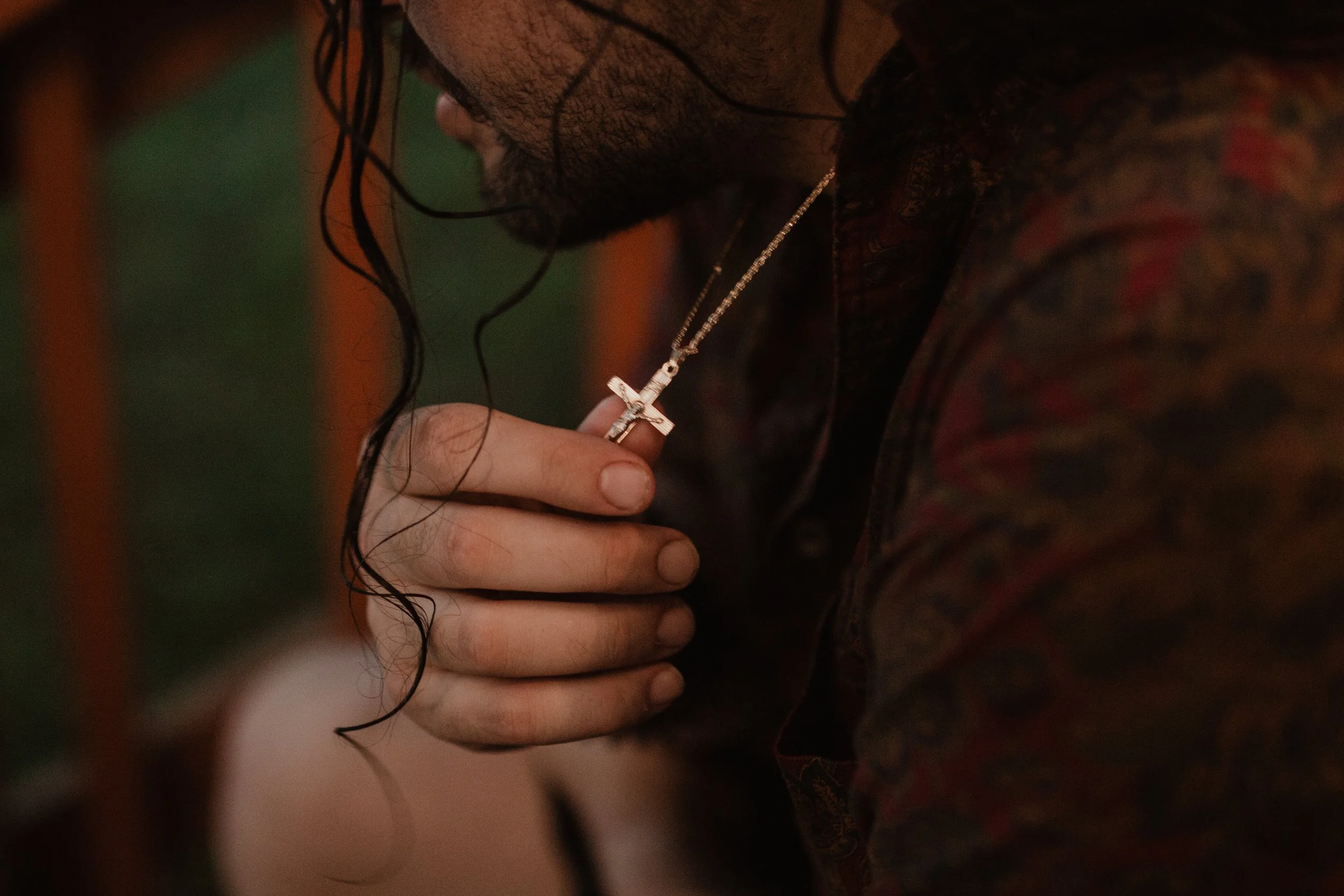 [When my husband is] praying, he'll oftentimes will hold his necklace. I find that really cool, just like this piece of his life that he carries with him all the time.    — Joanna Schaus