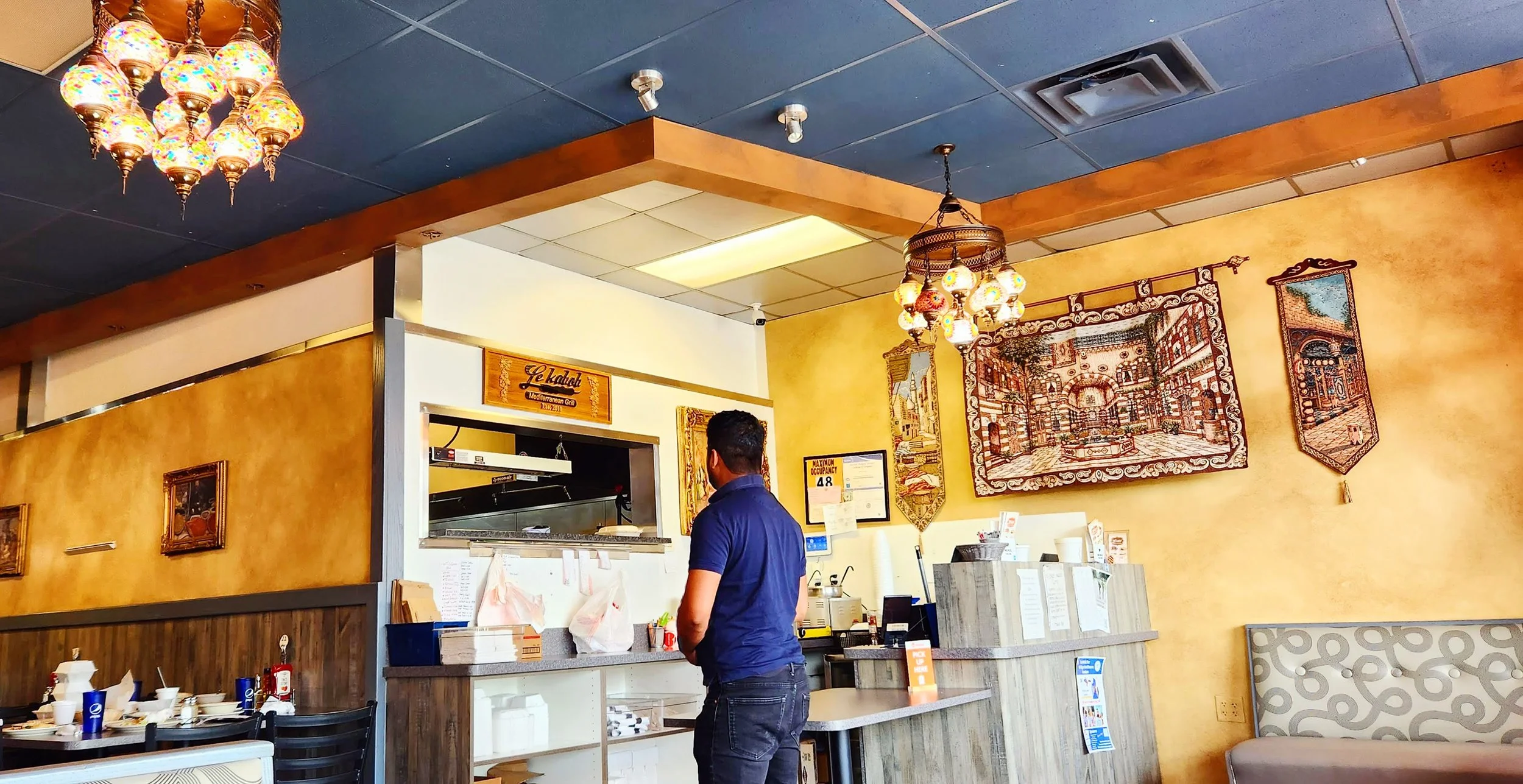 "This image captures the essence of a halal restaurant, where adherence to Islamic dietary laws ensures that the food served meets the requirements of Muslim consumers. The absence of halal meat options on campus remains a significant concern for me.