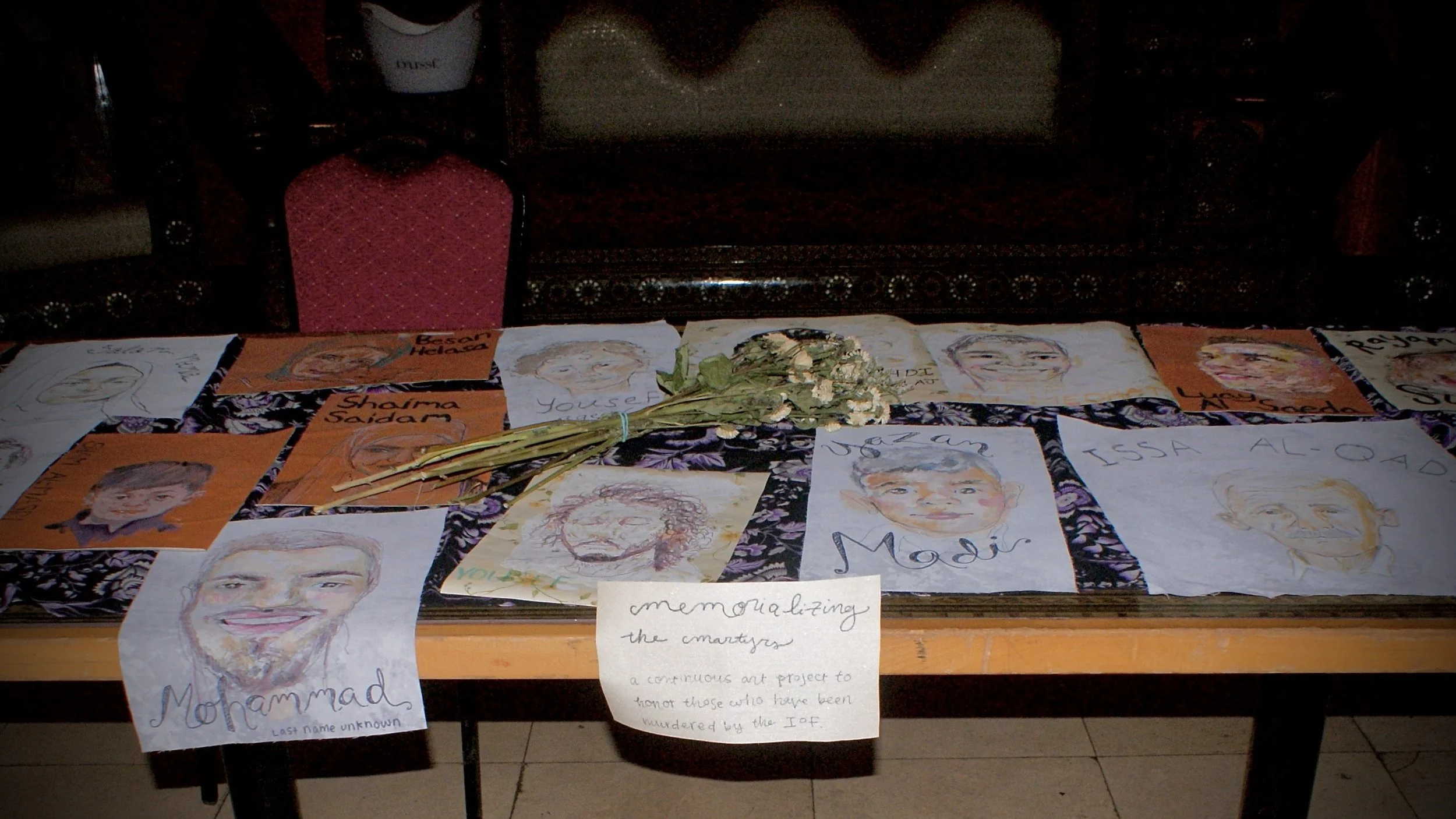 This was from a fundraising event, Stand with Gaza. Me and my friend, we have been memorializing the martyrs who have been killed in the genocide in Gaza. We've been painting the portraits of martyrs, the Palestinian martyrs, and we held a memorial s