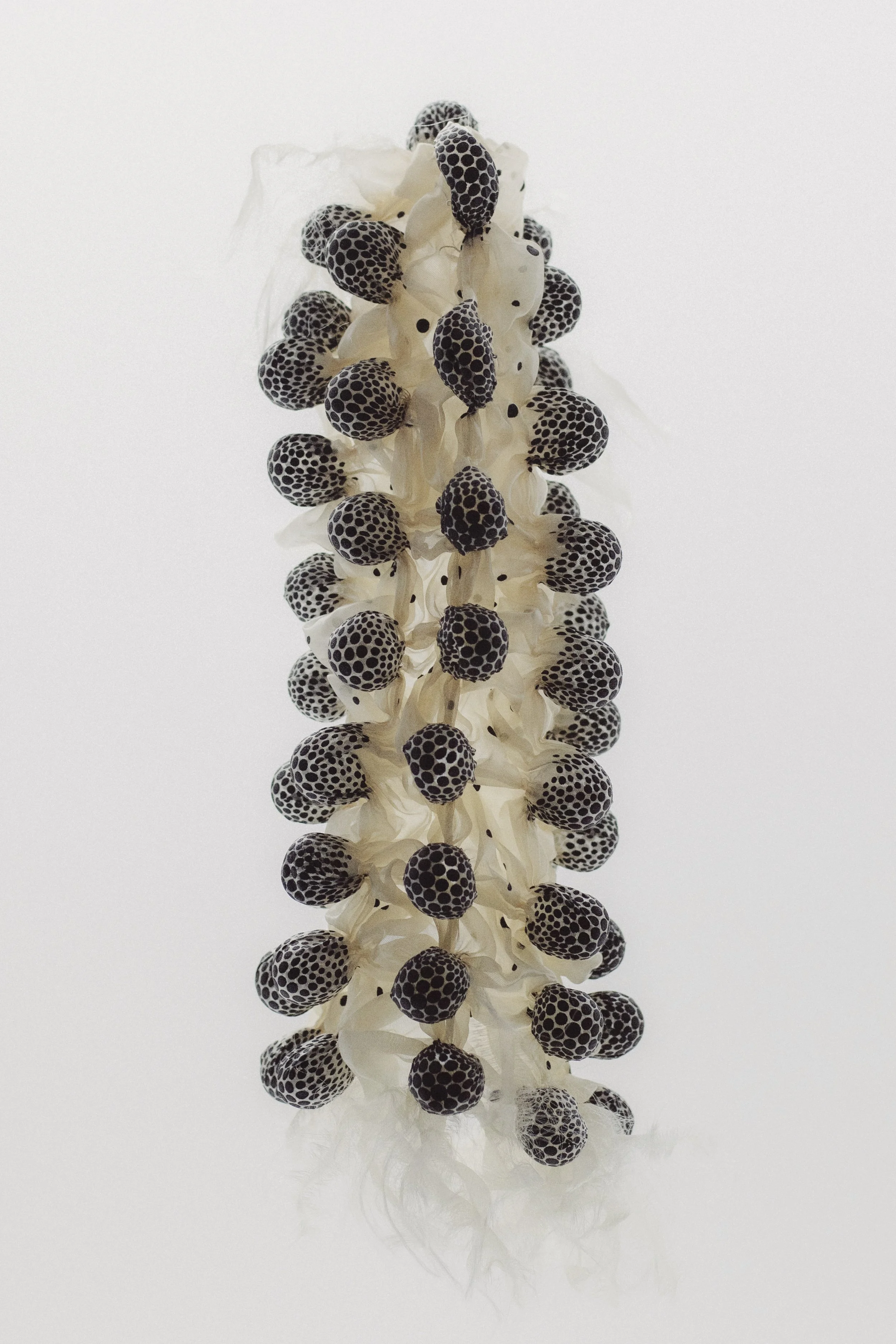 Heat-manipulated textile with silkscreen