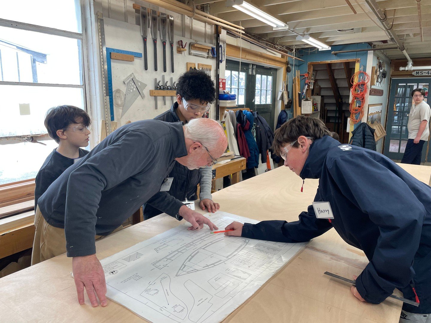 Boatbuilding update! ⚓️

Our young boatwrights have been hard at work every Saturday morning. Here are a few shots from a couple of weeks ago as they began building their Bevin&rsquo;s Skiff &mdash; measuring, cutting, and bringing their boat to life