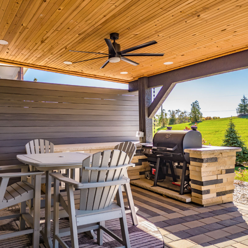 A grill alcove built into a hardscape patio located in Kansas City
