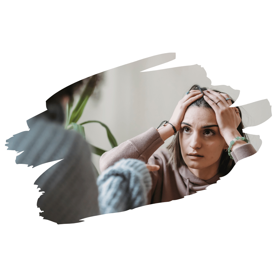 [Image] Young teen with hands on her head, conveying feeling anxious and overwhelmed, looking for teen anxiety support in Denver, CO at Interfaith Bridge Counseling.