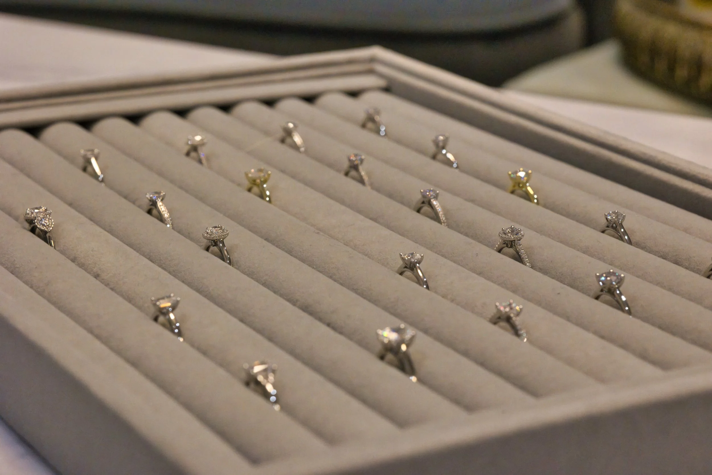 A selection of yellow gold and white gold diamond engagement rings